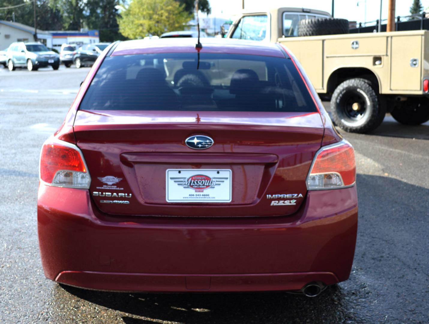 2013 Maroon /Black Subaru Impreza Premium Plus 4-Door (JF1GJAD64DH) with an 2.0L H4 DOHC 16V engine, Automatic transmission, located at 450 N Russell, Missoula, MT, 59801, (406) 543-6600, 46.874496, -114.017433 - All Wheel Drive. Automatic Transmission. Power Sun Roof. Heated Seats. Air. Cruise. Tilt. Power Windows and Locks. Bluetooth. - Photo#3