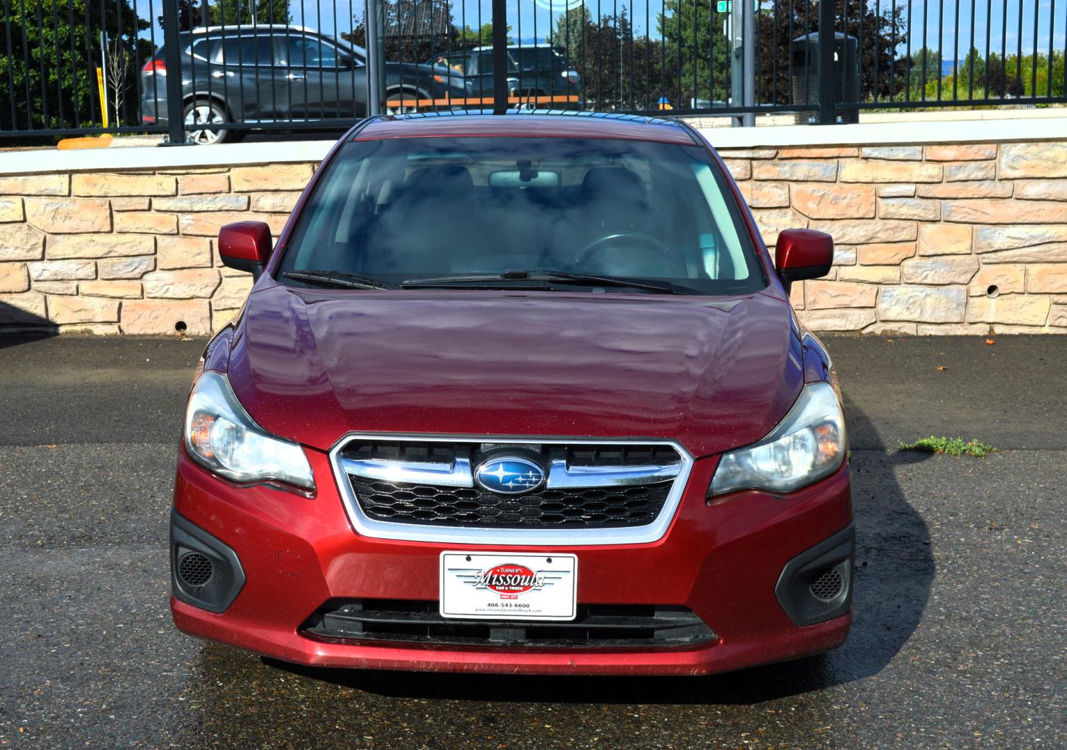 2013 Maroon /Black Subaru Impreza Premium Plus 4-Door (JF1GJAD64DH) with an 2.0L H4 DOHC 16V engine, Automatic transmission, located at 450 N Russell, Missoula, MT, 59801, (406) 543-6600, 46.874496, -114.017433 - All Wheel Drive. Automatic Transmission. Power Sun Roof. Heated Seats. Air. Cruise. Tilt. Power Windows and Locks. Bluetooth. - Photo#5