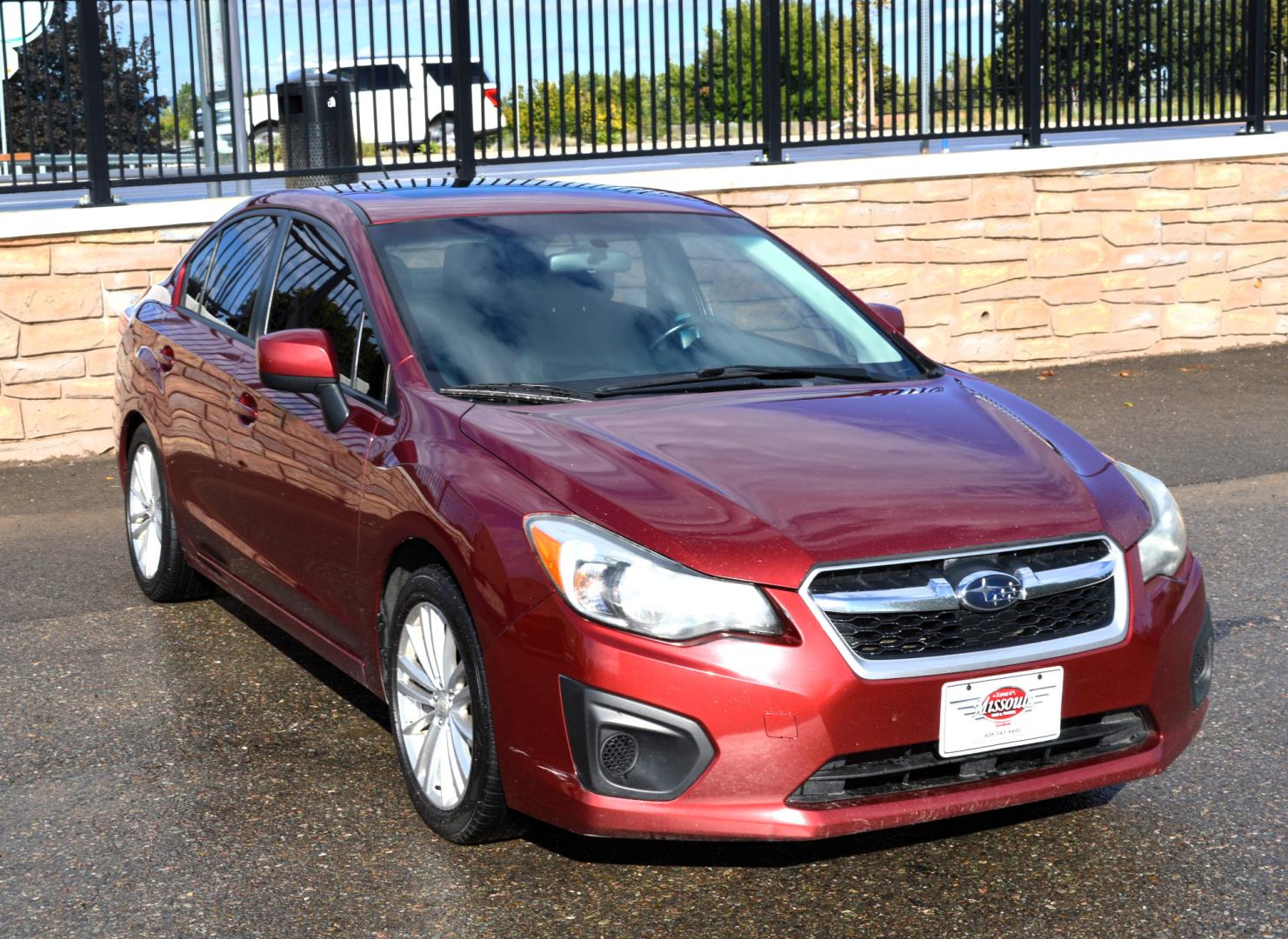 2013 Maroon /Black Subaru Impreza Premium Plus 4-Door (JF1GJAD64DH) with an 2.0L H4 DOHC 16V engine, Automatic transmission, located at 450 N Russell, Missoula, MT, 59801, (406) 543-6600, 46.874496, -114.017433 - All Wheel Drive. Automatic Transmission. Power Sun Roof. Heated Seats. Air. Cruise. Tilt. Power Windows and Locks. Bluetooth. - Photo#6