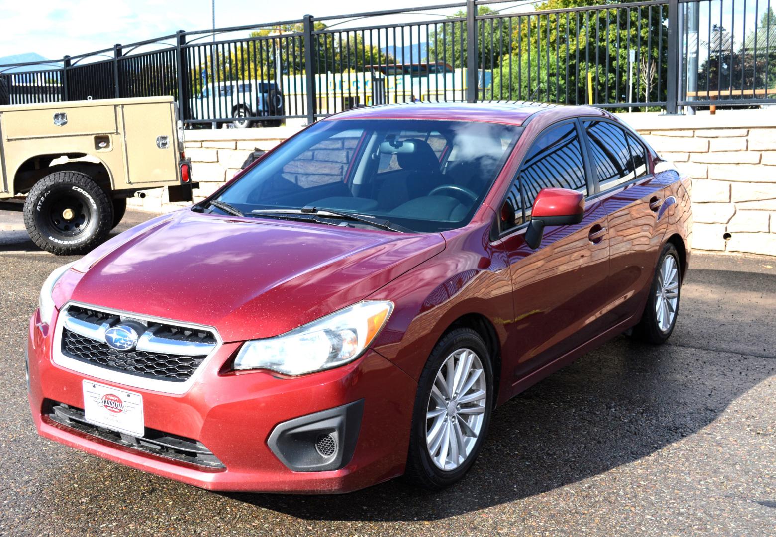 2013 Maroon /Black Subaru Impreza Premium Plus 4-Door (JF1GJAD64DH) with an 2.0L H4 DOHC 16V engine, Automatic transmission, located at 450 N Russell, Missoula, MT, 59801, (406) 543-6600, 46.874496, -114.017433 - All Wheel Drive. Automatic Transmission. Power Sun Roof. Heated Seats. Air. Cruise. Tilt. Power Windows and Locks. Bluetooth. - Photo#7