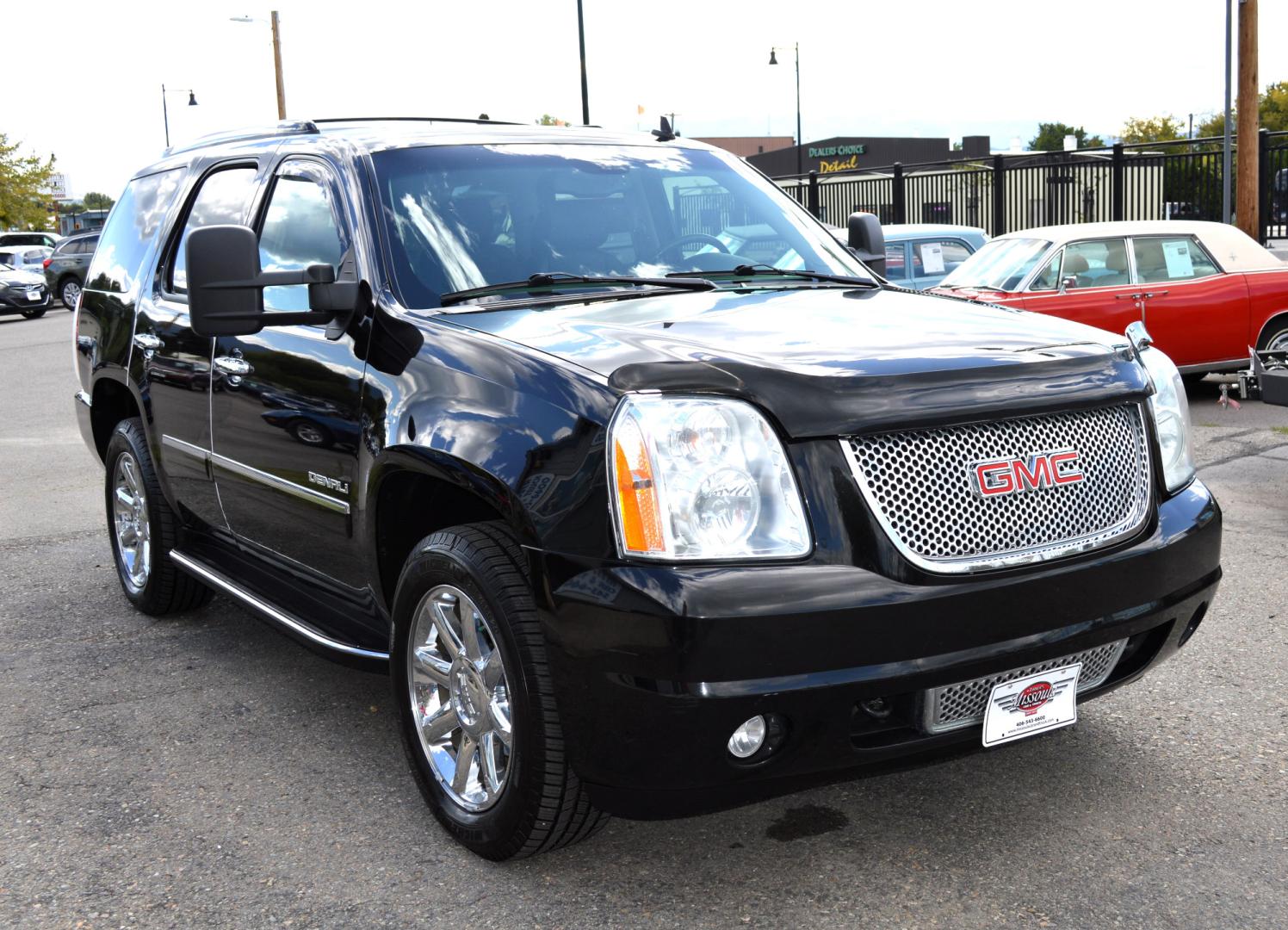 2013 Black /Black GMC Yukon Denali 4WD (1GKS2EEF6DR) with an 6.2L V8 OHV 16V engine, 6-Speed Automatic transmission, located at 450 N Russell, Missoula, MT, 59801, (406) 543-6600, 46.874496, -114.017433 - Excellent Condition SUV. Leather Heated Power Seats. Rear Bucket Seats. 3rd Row Seating. Power Sunroof. Rear Entertainment. Rear Climate Control. Like New Michelin Tires - Photo#2