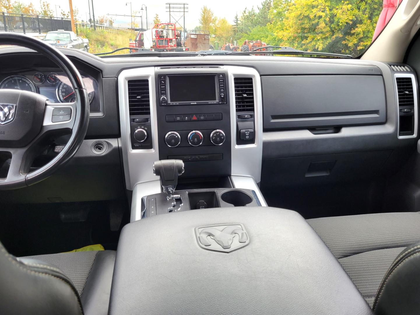 2011 Grey /Black Dodge Ram 1500 ST Crew Cab 4WD (1D7RV1CTXBS) with an 5.7L V8 OHV 16V engine, 5-Speed Automatic transmission, located at 450 N Russell, Missoula, MT, 59801, (406) 543-6600, 46.874496, -114.017433 - Really Nice Truck. Hemi. 4 Wheel Drive. 5 Speed Automatic Transmission. Power Drivers Seat. Air. Cruise. Tilt. AM FM CD Player. Satellite Radio. Power Windows and Locks. Tonneau Cover. Towing. - Photo#13