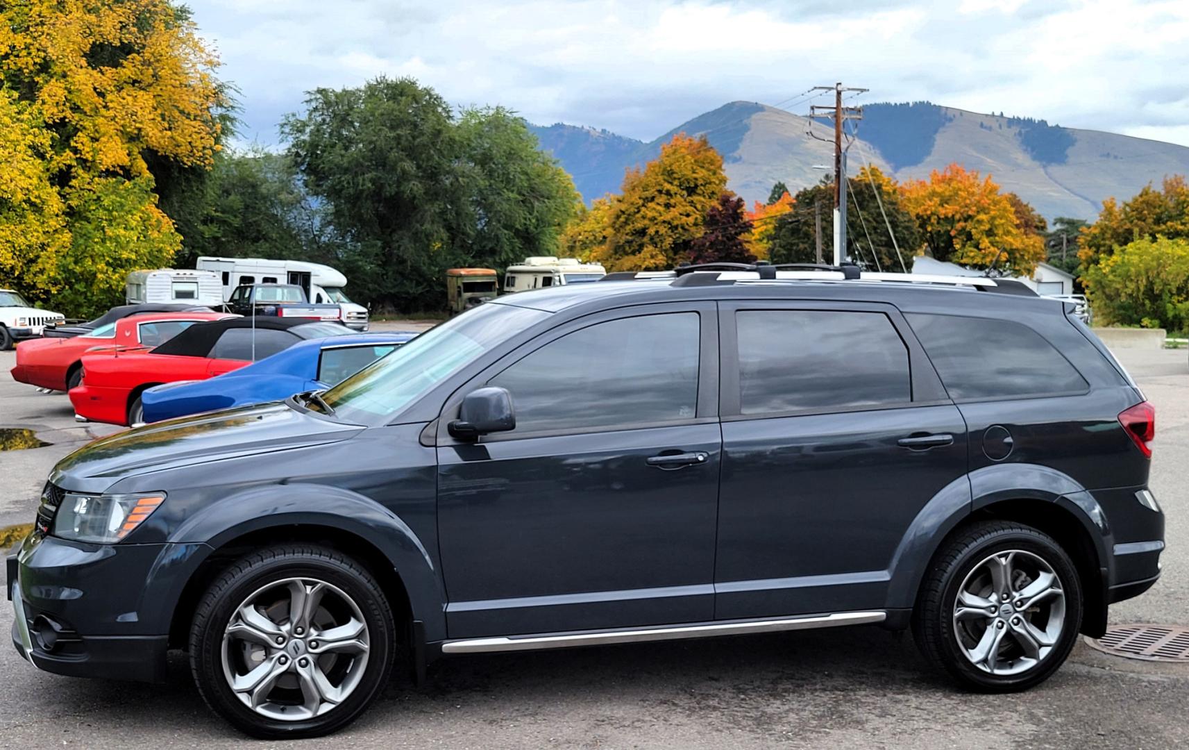 2018 Charcoal /Black Dodge Journey Crossroad AWD (3C4PDDGG7JT) with an 3.6L V6 DOHC 24V engine, 6A transmission, located at 450 N Russell, Missoula, MT, 59801, (406) 543-6600, 46.874496, -114.017433 - Nice AWD SUV. 3rd Row Seating. Front and Rear Climate Control. Heated Leather Seats. Heated Steering Wheel. Touch Screen. Bluetooth. AM FM CD. Backup Camera. Air. Cruise. Tilt. Steering Wheel Controls. Remote Start. - Photo#9