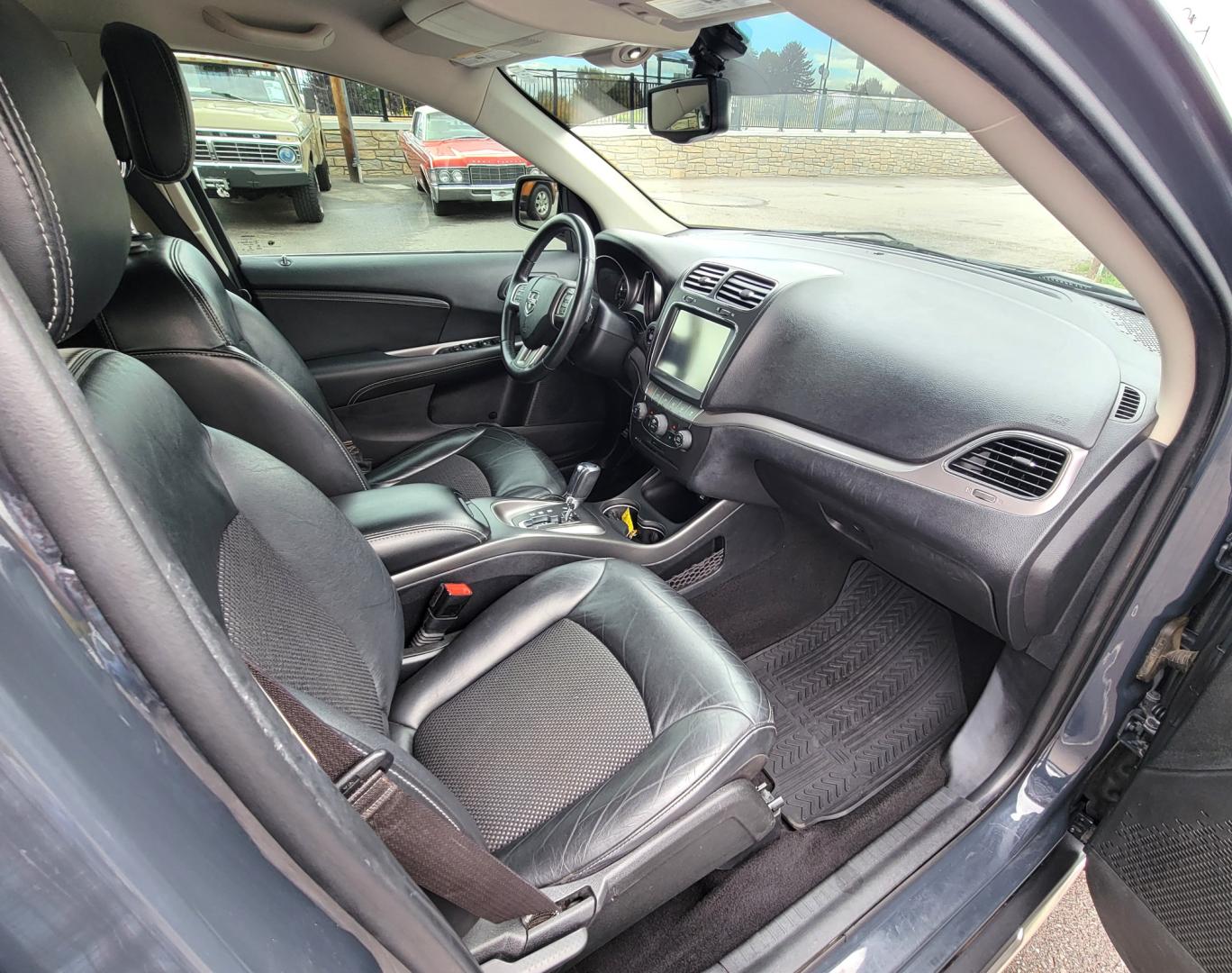 2018 Charcoal /Black Dodge Journey Crossroad AWD (3C4PDDGG7JT) with an 3.6L V6 DOHC 24V engine, 6A transmission, located at 450 N Russell, Missoula, MT, 59801, (406) 543-6600, 46.874496, -114.017433 - Nice AWD SUV. 3rd Row Seating. Front and Rear Climate Control. Heated Leather Seats. Heated Steering Wheel. Touch Screen. Bluetooth. AM FM CD. Backup Camera. Air. Cruise. Tilt. Steering Wheel Controls. Remote Start. - Photo#16