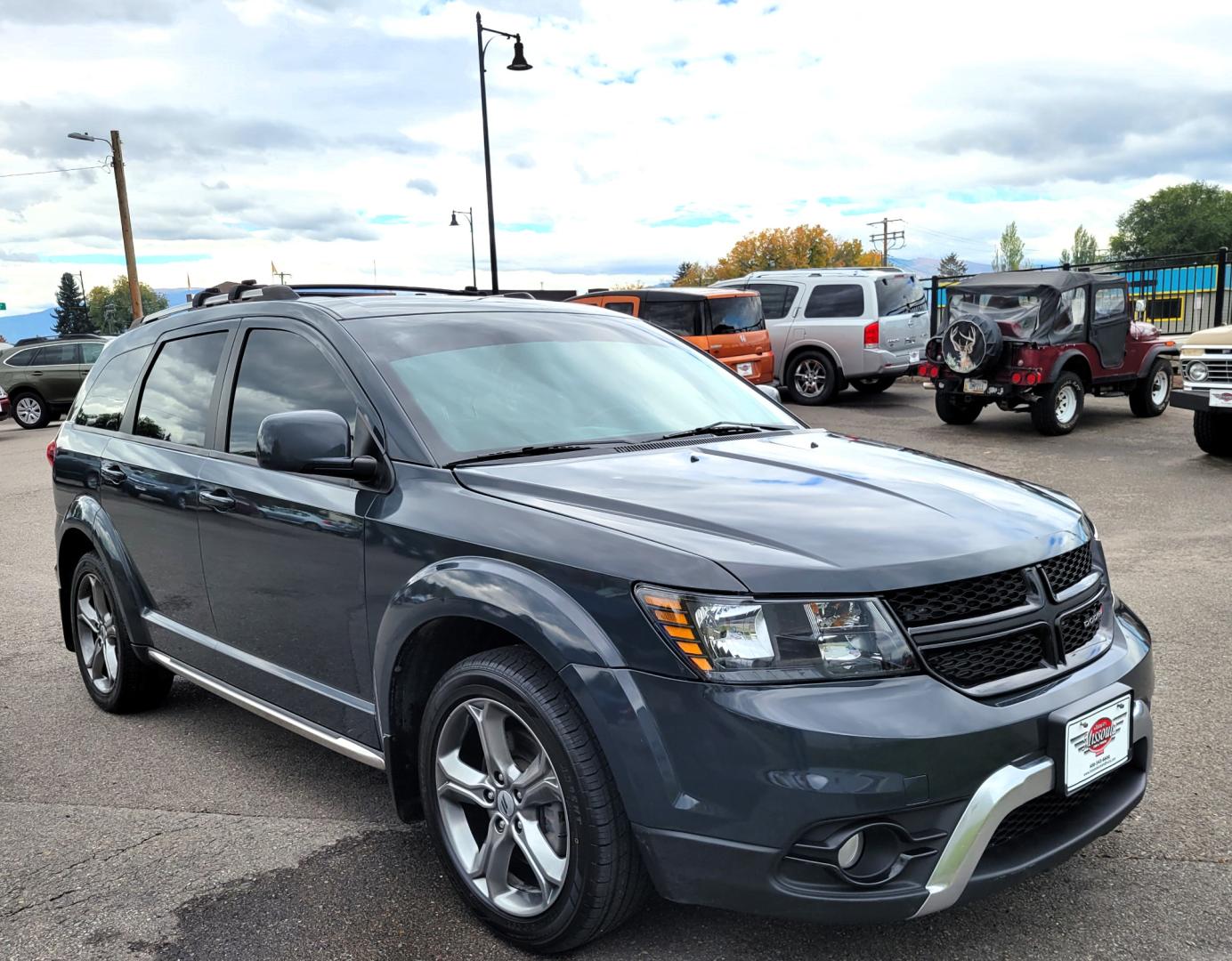 2018 Charcoal /Black Dodge Journey Crossroad AWD (3C4PDDGG7JT) with an 3.6L V6 DOHC 24V engine, 6A transmission, located at 450 N Russell, Missoula, MT, 59801, (406) 543-6600, 46.874496, -114.017433 - Nice AWD SUV. 3rd Row Seating. Front and Rear Climate Control. Heated Leather Seats. Heated Steering Wheel. Touch Screen. Bluetooth. AM FM CD. Backup Camera. Air. Cruise. Tilt. Steering Wheel Controls. Remote Start. - Photo#4