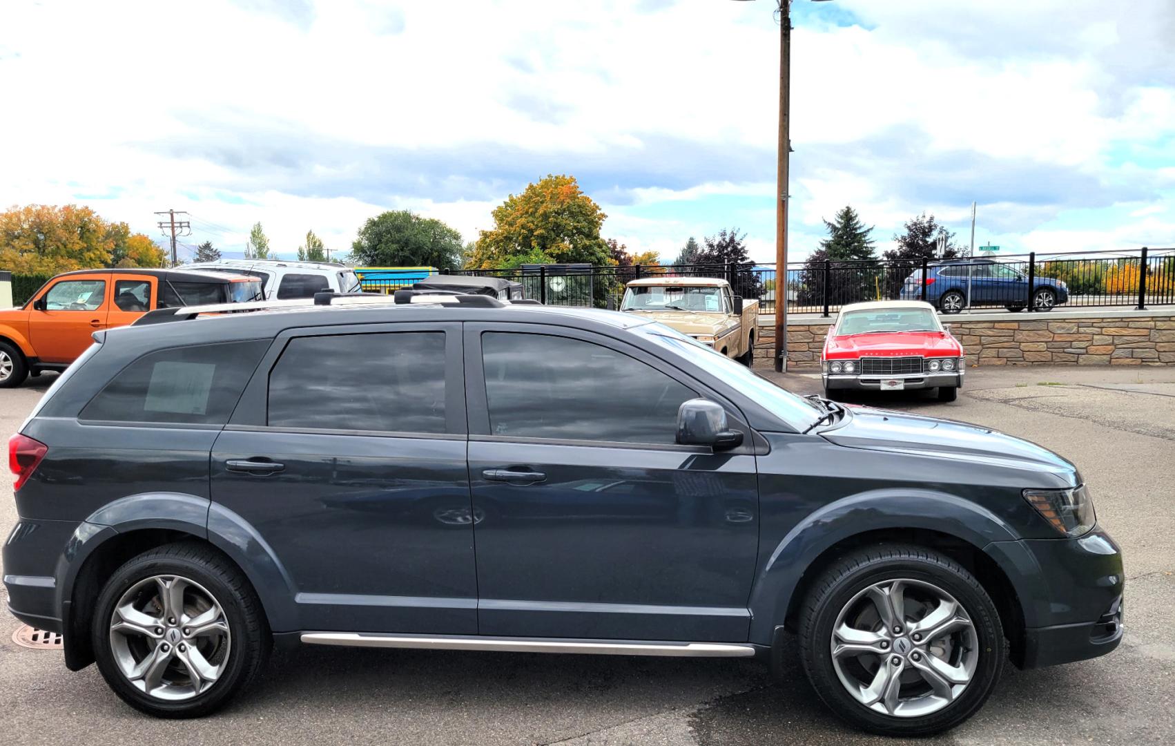 2018 Charcoal /Black Dodge Journey Crossroad AWD (3C4PDDGG7JT) with an 3.6L V6 DOHC 24V engine, 6A transmission, located at 450 N Russell, Missoula, MT, 59801, (406) 543-6600, 46.874496, -114.017433 - Nice AWD SUV. 3rd Row Seating. Front and Rear Climate Control. Heated Leather Seats. Heated Steering Wheel. Touch Screen. Bluetooth. AM FM CD. Backup Camera. Air. Cruise. Tilt. Steering Wheel Controls. Remote Start. - Photo#5