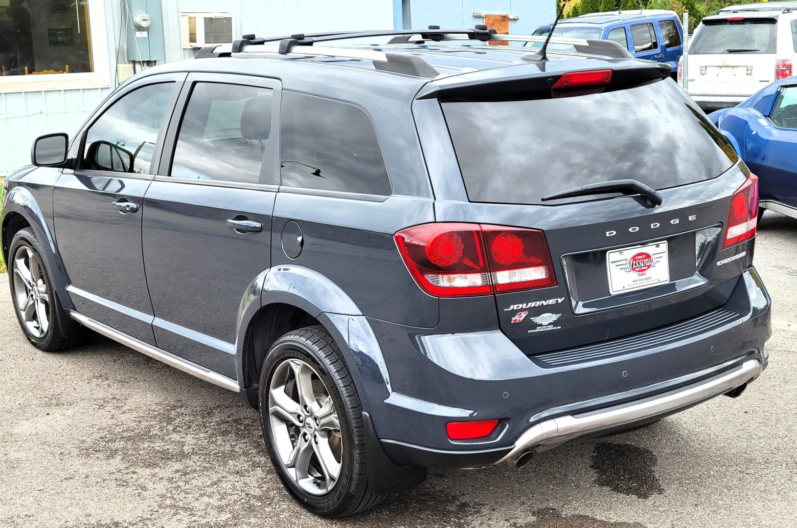 2018 Charcoal /Black Dodge Journey Crossroad AWD (3C4PDDGG7JT) with an 3.6L V6 DOHC 24V engine, 6A transmission, located at 450 N Russell, Missoula, MT, 59801, (406) 543-6600, 46.874496, -114.017433 - Nice AWD SUV. 3rd Row Seating. Front and Rear Climate Control. Heated Leather Seats. Heated Steering Wheel. Touch Screen. Bluetooth. AM FM CD. Backup Camera. Air. Cruise. Tilt. Steering Wheel Controls. Remote Start. - Photo#8