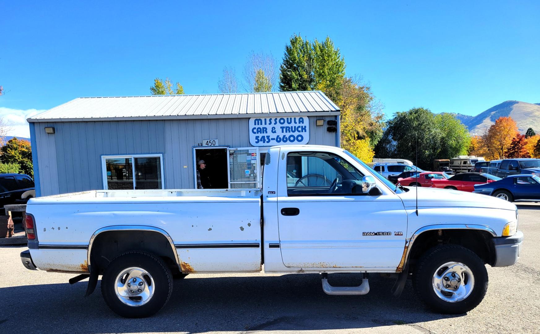 1996 White Dodge Ram 1500 Reg. Cab 8-ft. Bed 4WD (1B7HF16Y2TS) with an 5.2L V8 OHV 16V engine, 5 Speed Manual transmission, located at 450 N Russell, Missoula, MT, 59801, (406) 543-6600, 46.874496, -114.017433 - 5 Speed Manual Transmission. 4 Wheel Drive. Air. Cruise. Tilt. Power Windows and Locks. This vehicle is more then 20 years old and is not eligible for lending through our finance companies. - Photo#0