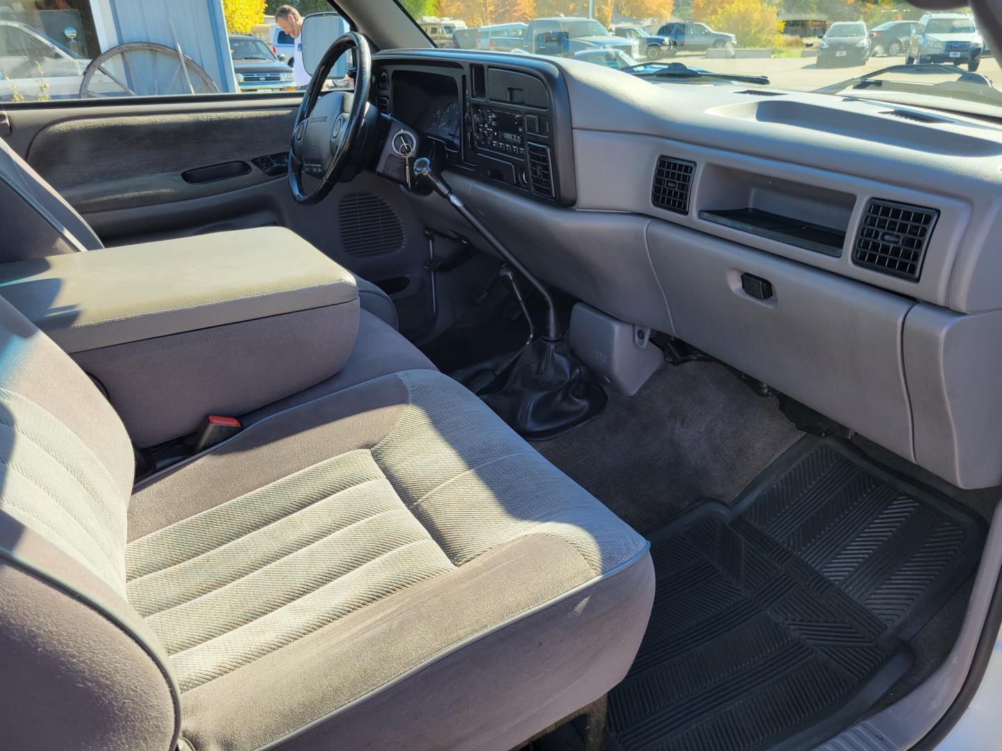 1996 White Dodge Ram 1500 Reg. Cab 8-ft. Bed 4WD (1B7HF16Y2TS) with an 5.2L V8 OHV 16V engine, 5 Speed Manual transmission, located at 450 N Russell, Missoula, MT, 59801, (406) 543-6600, 46.874496, -114.017433 - 5 Speed Manual Transmission. 4 Wheel Drive. Air. Cruise. Tilt. Power Windows and Locks. This vehicle is more then 20 years old and is not eligible for lending through our finance companies. - Photo#11