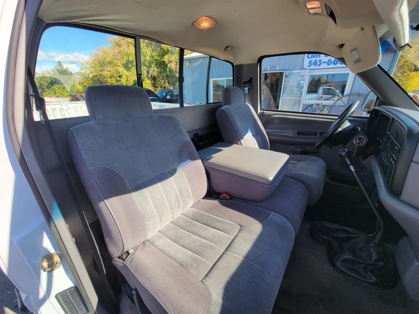 1996 White Dodge Ram 1500 Reg. Cab 8-ft. Bed 4WD (1B7HF16Y2TS) with an 5.2L V8 OHV 16V engine, 5 Speed Manual transmission, located at 450 N Russell, Missoula, MT, 59801, (406) 543-6600, 46.874496, -114.017433 - 5 Speed Manual Transmission. 4 Wheel Drive. Air. Cruise. Tilt. Power Windows and Locks. This vehicle is more then 20 years old and is not eligible for lending through our finance companies. - Photo#12