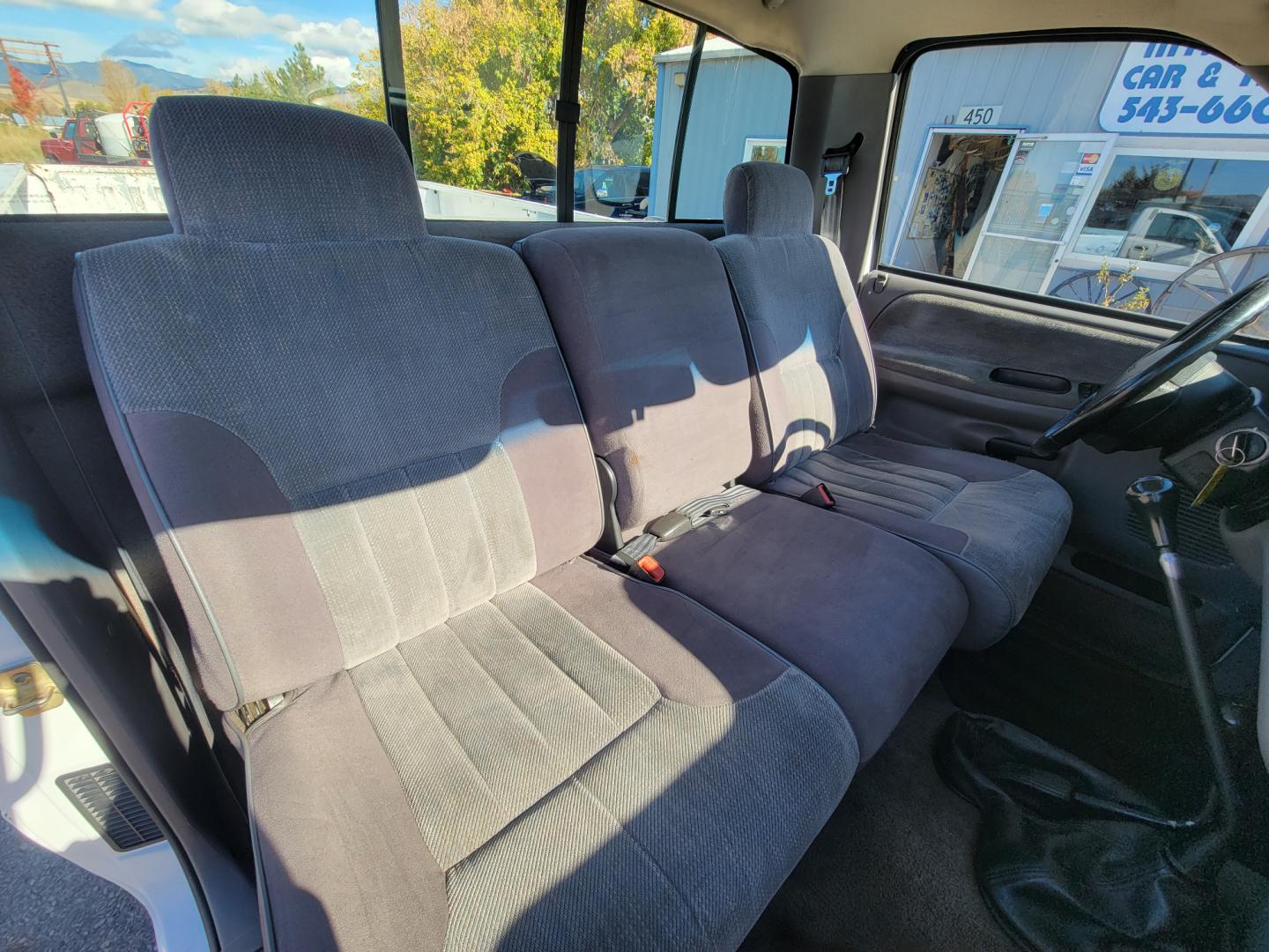 1996 White Dodge Ram 1500 Reg. Cab 8-ft. Bed 4WD (1B7HF16Y2TS) with an 5.2L V8 OHV 16V engine, 5 Speed Manual transmission, located at 450 N Russell, Missoula, MT, 59801, (406) 543-6600, 46.874496, -114.017433 - 5 Speed Manual Transmission. 4 Wheel Drive. Air. Cruise. Tilt. Power Windows and Locks. This vehicle is more then 20 years old and is not eligible for lending through our finance companies. - Photo#13