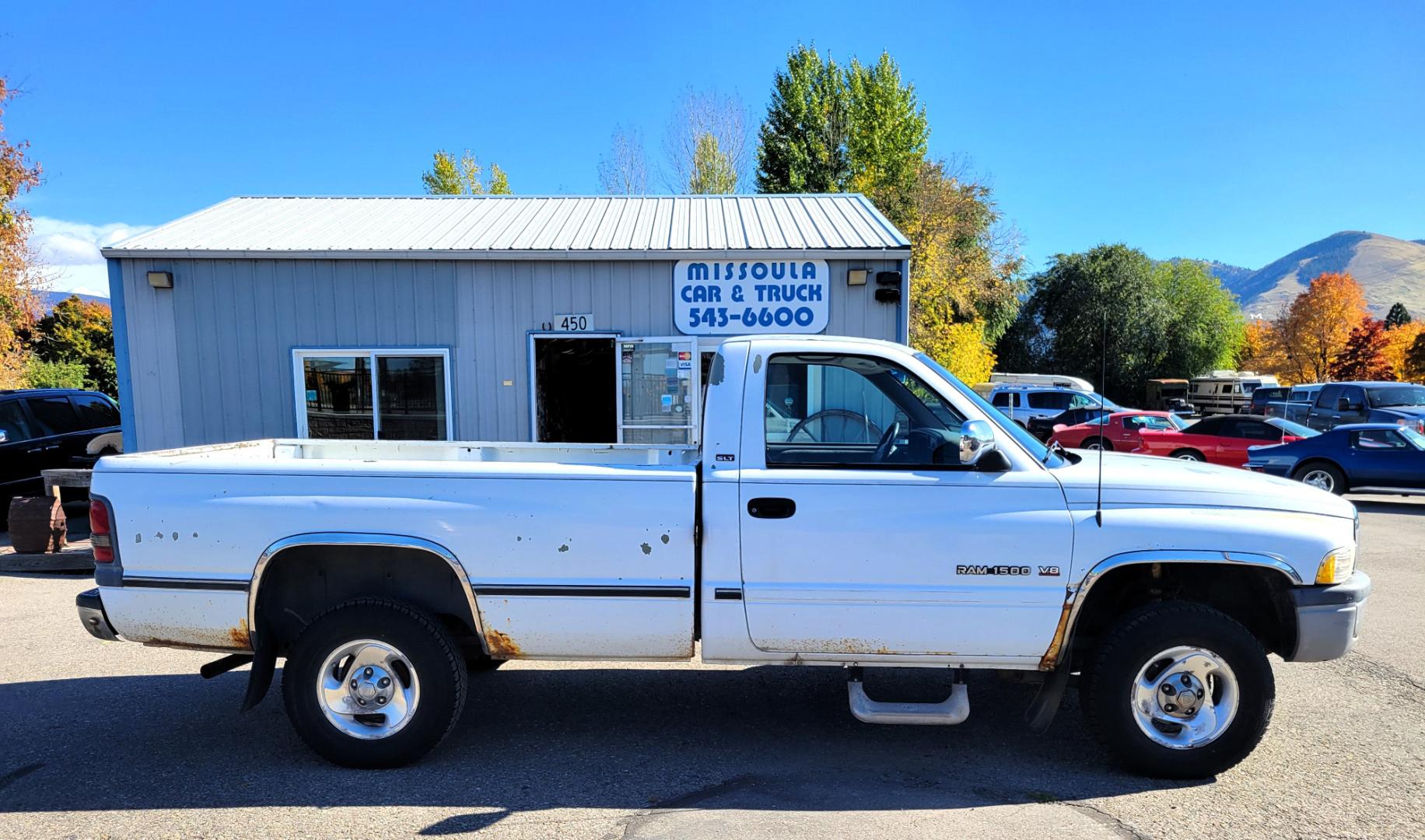 1996 White Dodge Ram 1500 Reg. Cab 8-ft. Bed 4WD (1B7HF16Y2TS) with an 5.2L V8 OHV 16V engine, 5 Speed Manual transmission, located at 450 N Russell, Missoula, MT, 59801, (406) 543-6600, 46.874496, -114.017433 - 5 Speed Manual Transmission. 4 Wheel Drive. Air. Cruise. Tilt. Power Windows and Locks. This vehicle is more then 20 years old and is not eligible for lending through our finance companies. - Photo#1