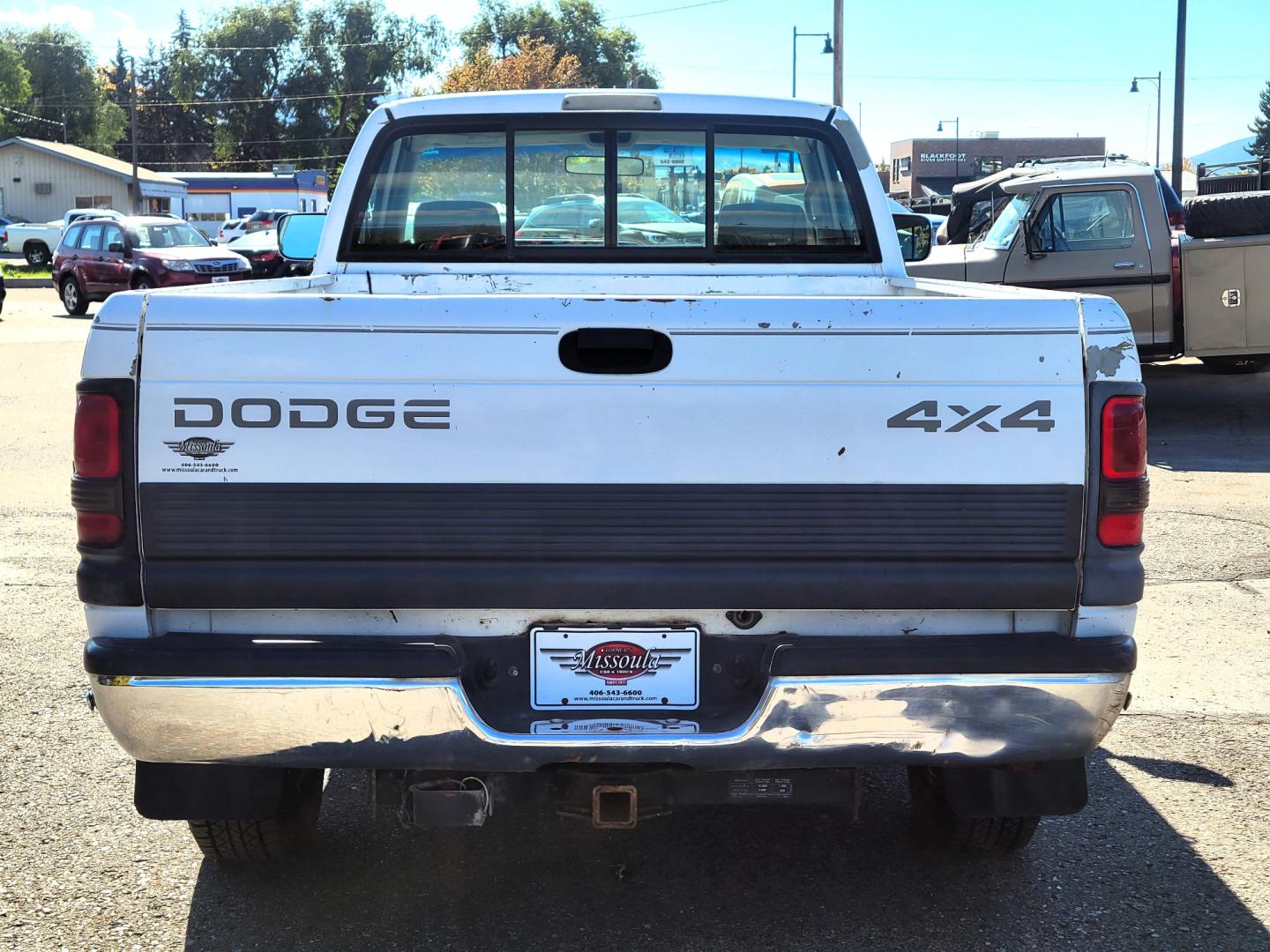 1996 White Dodge Ram 1500 Reg. Cab 8-ft. Bed 4WD (1B7HF16Y2TS) with an 5.2L V8 OHV 16V engine, 5 Speed Manual transmission, located at 450 N Russell, Missoula, MT, 59801, (406) 543-6600, 46.874496, -114.017433 - 5 Speed Manual Transmission. 4 Wheel Drive. Air. Cruise. Tilt. Power Windows and Locks. This vehicle is more then 20 years old and is not eligible for lending through our finance companies. - Photo#3