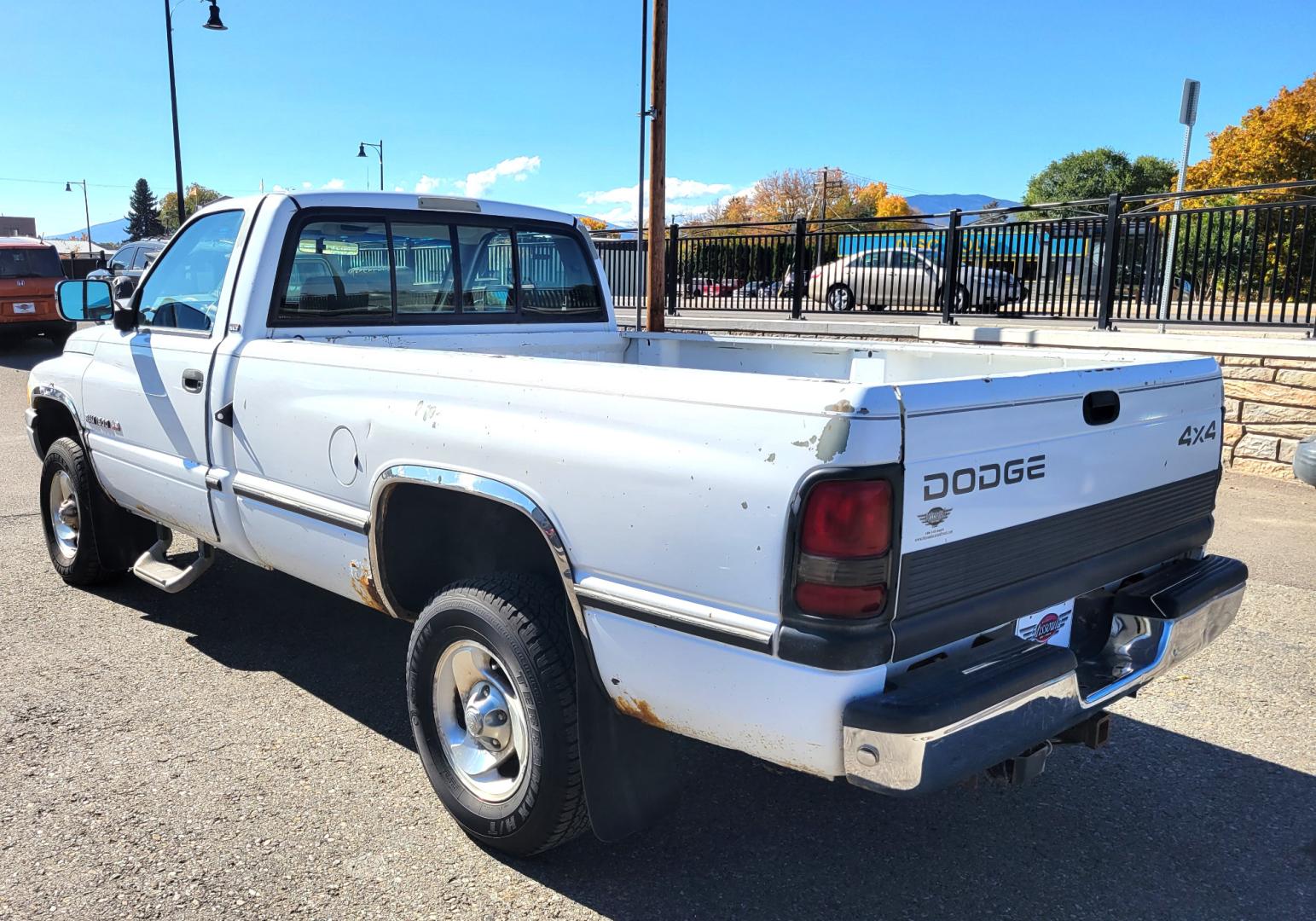 1996 White Dodge Ram 1500 Reg. Cab 8-ft. Bed 4WD (1B7HF16Y2TS) with an 5.2L V8 OHV 16V engine, 5 Speed Manual transmission, located at 450 N Russell, Missoula, MT, 59801, (406) 543-6600, 46.874496, -114.017433 - 5 Speed Manual Transmission. 4 Wheel Drive. Air. Cruise. Tilt. Power Windows and Locks. This vehicle is more then 20 years old and is not eligible for lending through our finance companies. - Photo#4