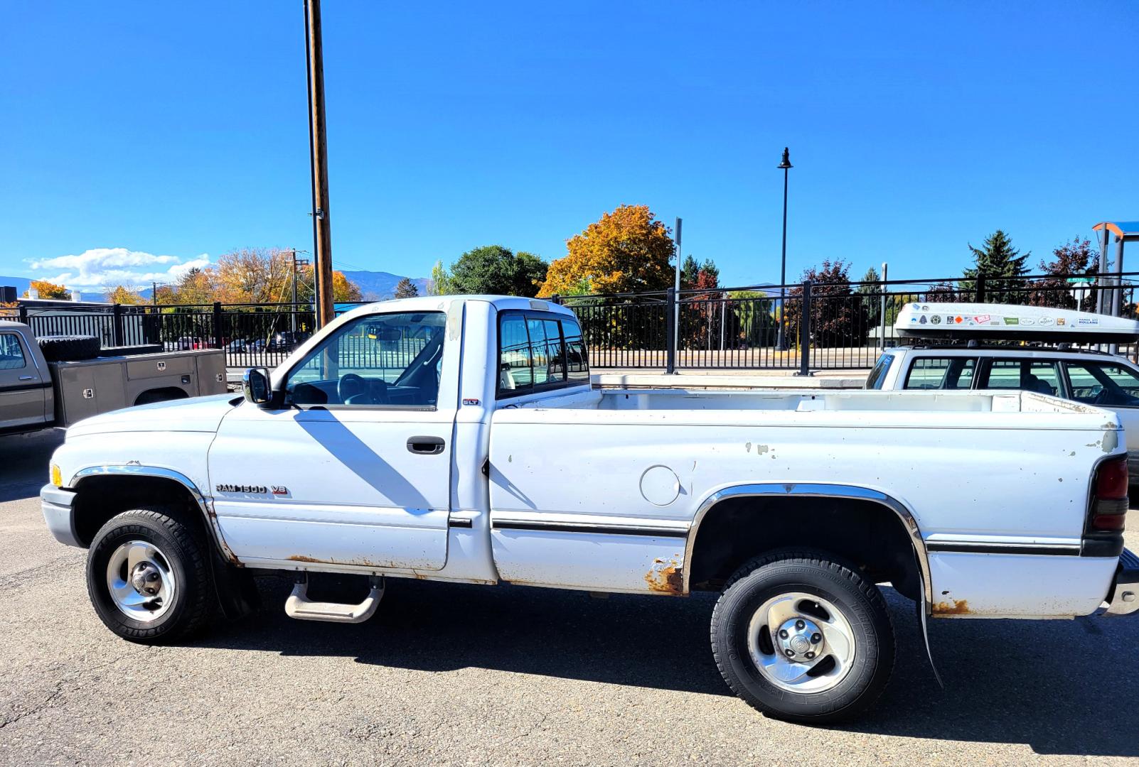 1996 White Dodge Ram 1500 Reg. Cab 8-ft. Bed 4WD (1B7HF16Y2TS) with an 5.2L V8 OHV 16V engine, 5 Speed Manual transmission, located at 450 N Russell, Missoula, MT, 59801, (406) 543-6600, 46.874496, -114.017433 - 5 Speed Manual Transmission. 4 Wheel Drive. Air. Cruise. Tilt. Power Windows and Locks. This vehicle is more then 20 years old and is not eligible for lending through our finance companies. - Photo#5