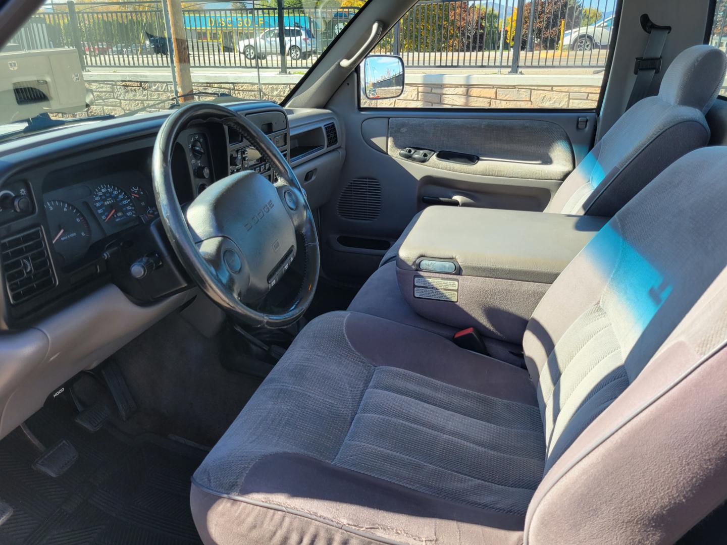 1996 White Dodge Ram 1500 Reg. Cab 8-ft. Bed 4WD (1B7HF16Y2TS) with an 5.2L V8 OHV 16V engine, 5 Speed Manual transmission, located at 450 N Russell, Missoula, MT, 59801, (406) 543-6600, 46.874496, -114.017433 - 5 Speed Manual Transmission. 4 Wheel Drive. Air. Cruise. Tilt. Power Windows and Locks. This vehicle is more then 20 years old and is not eligible for lending through our finance companies. - Photo#7