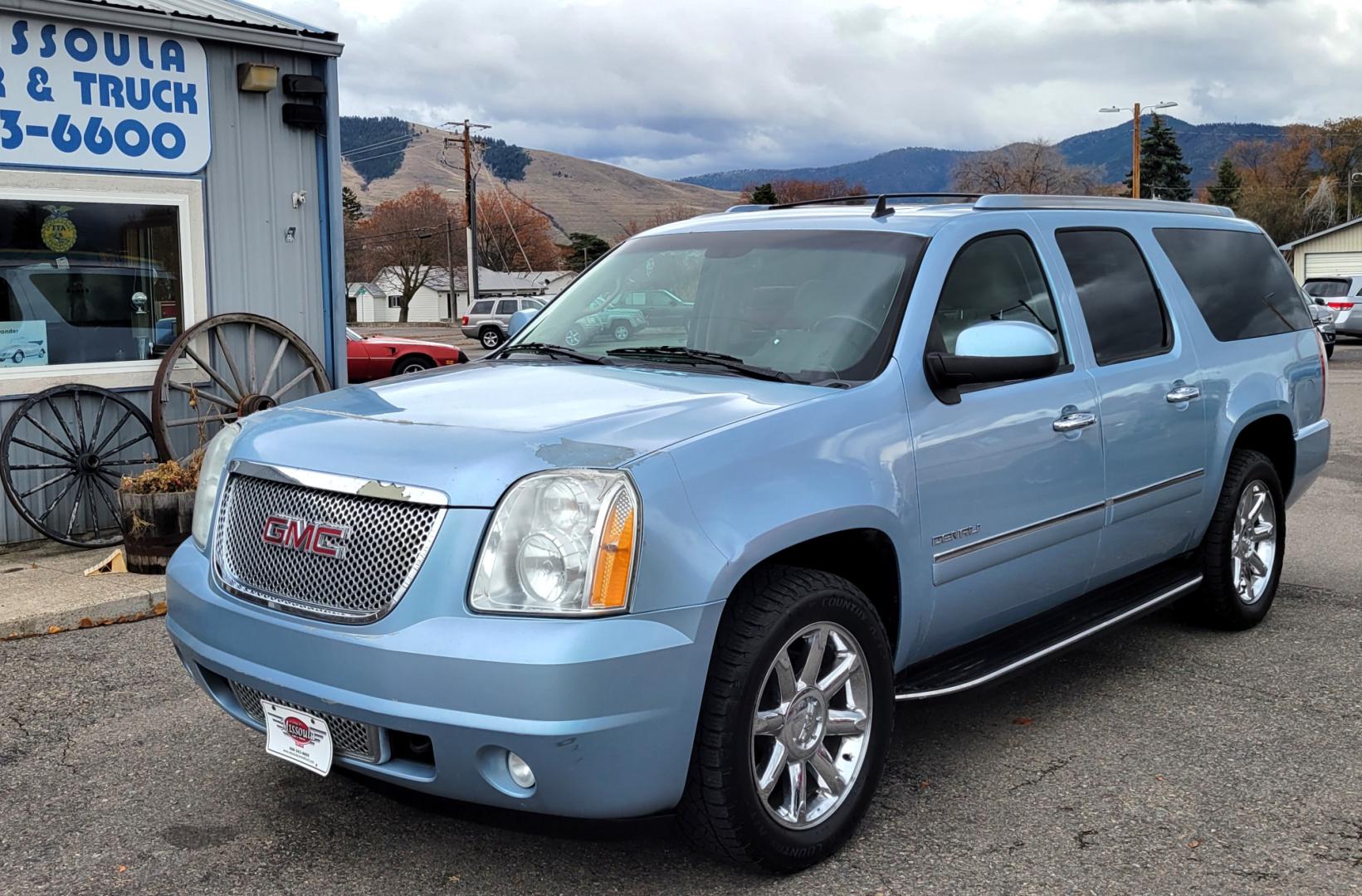 2011 Blue /Tan GMC Yukon Denali XL 4WD (1GKS2MEFXBR) with an 6.2L V8 OHV 16V engine, 4-Speed Automatic transmission, located at 450 N Russell, Missoula, MT, 59801, (406) 543-6600, 46.874496, -114.017433 - All Wheel Drive Denali. 3rd Row Seating. Rear Entertainment. Power Sunroof. Air. Cruise. Tilt. Power Leather Seats. Navigation. Towing. Running Boards. - Photo#1