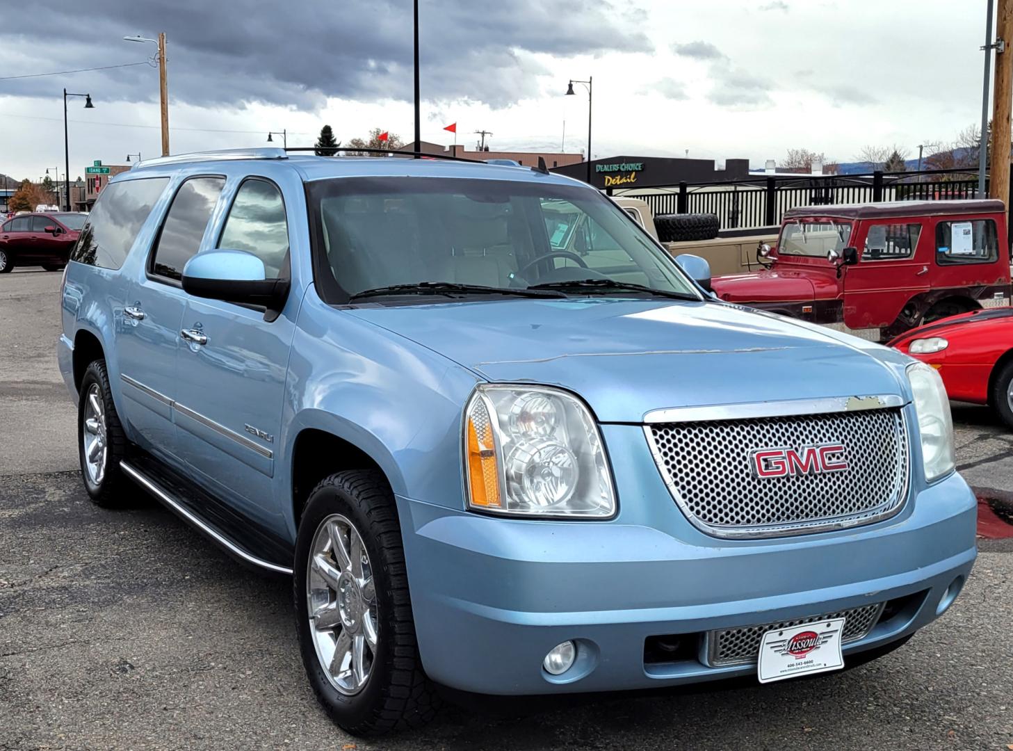 2011 Blue /Tan GMC Yukon Denali XL 4WD (1GKS2MEFXBR) with an 6.2L V8 OHV 16V engine, 4-Speed Automatic transmission, located at 450 N Russell, Missoula, MT, 59801, (406) 543-6600, 46.874496, -114.017433 - All Wheel Drive Denali. 3rd Row Seating. Rear Entertainment. Power Sunroof. Air. Cruise. Tilt. Power Leather Seats. Navigation. Towing. Running Boards. - Photo#3