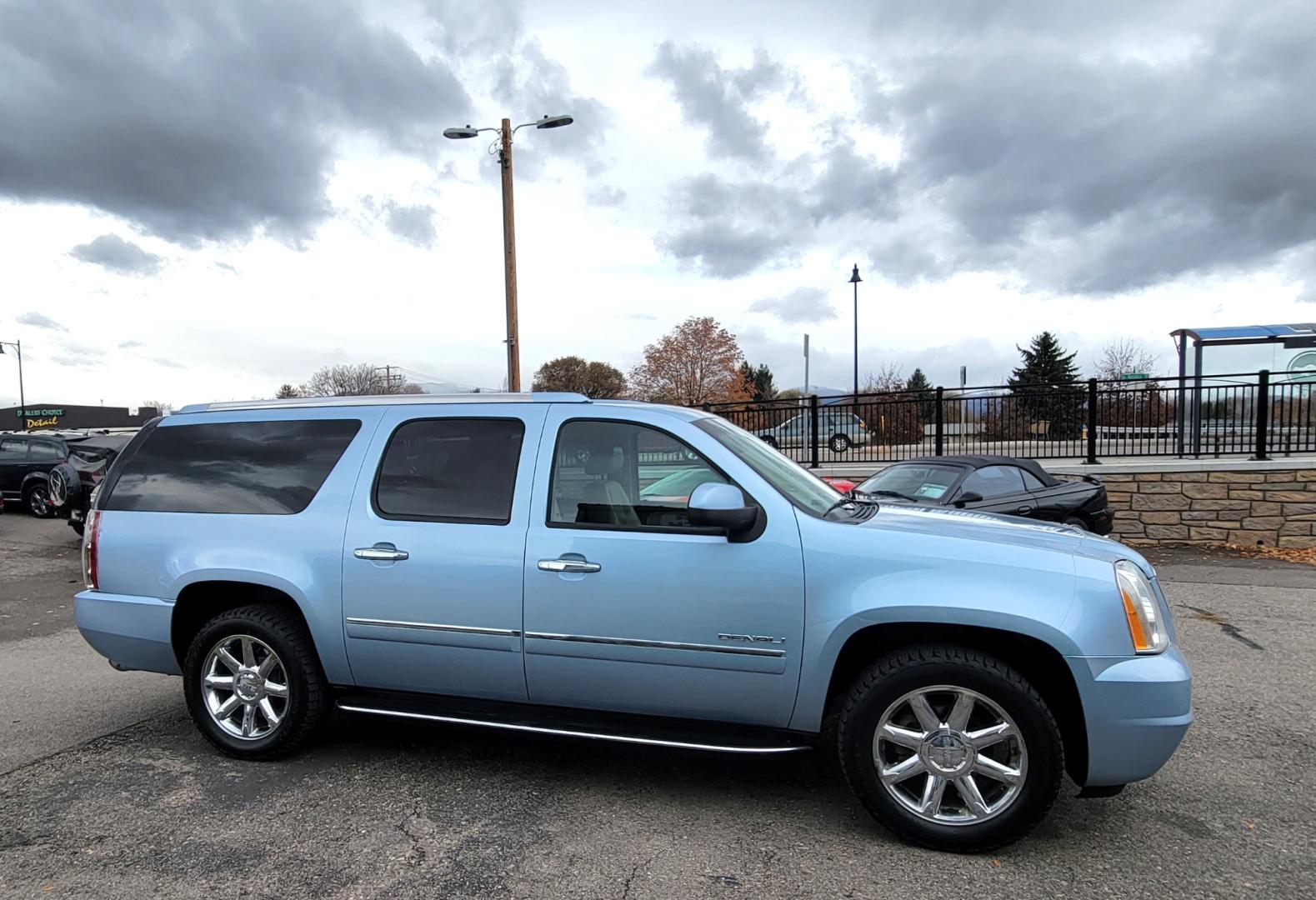 2011 Blue /Tan GMC Yukon Denali XL 4WD (1GKS2MEFXBR) with an 6.2L V8 OHV 16V engine, 4-Speed Automatic transmission, located at 450 N Russell, Missoula, MT, 59801, (406) 543-6600, 46.874496, -114.017433 - All Wheel Drive Denali. 3rd Row Seating. Rear Entertainment. Power Sunroof. Air. Cruise. Tilt. Power Leather Seats. Navigation. Towing. Running Boards. - Photo#4