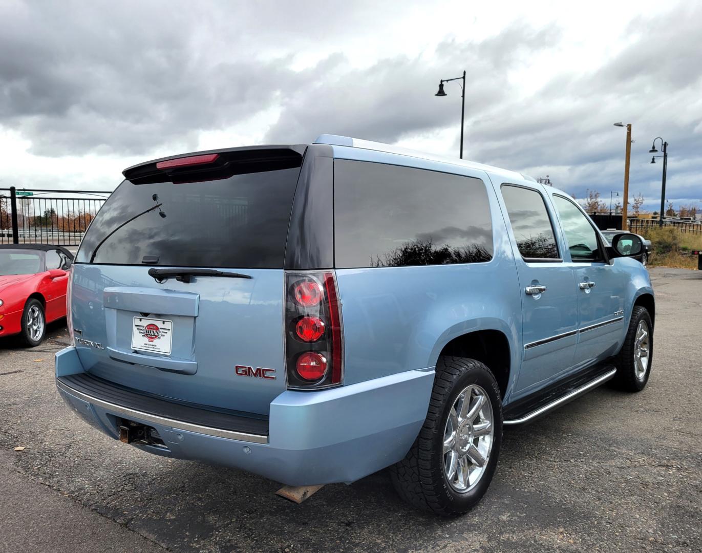 2011 Blue /Tan GMC Yukon Denali XL 4WD (1GKS2MEFXBR) with an 6.2L V8 OHV 16V engine, 4-Speed Automatic transmission, located at 450 N Russell, Missoula, MT, 59801, (406) 543-6600, 46.874496, -114.017433 - All Wheel Drive Denali. 3rd Row Seating. Rear Entertainment. Power Sunroof. Air. Cruise. Tilt. Power Leather Seats. Navigation. Towing. Running Boards. - Photo#5