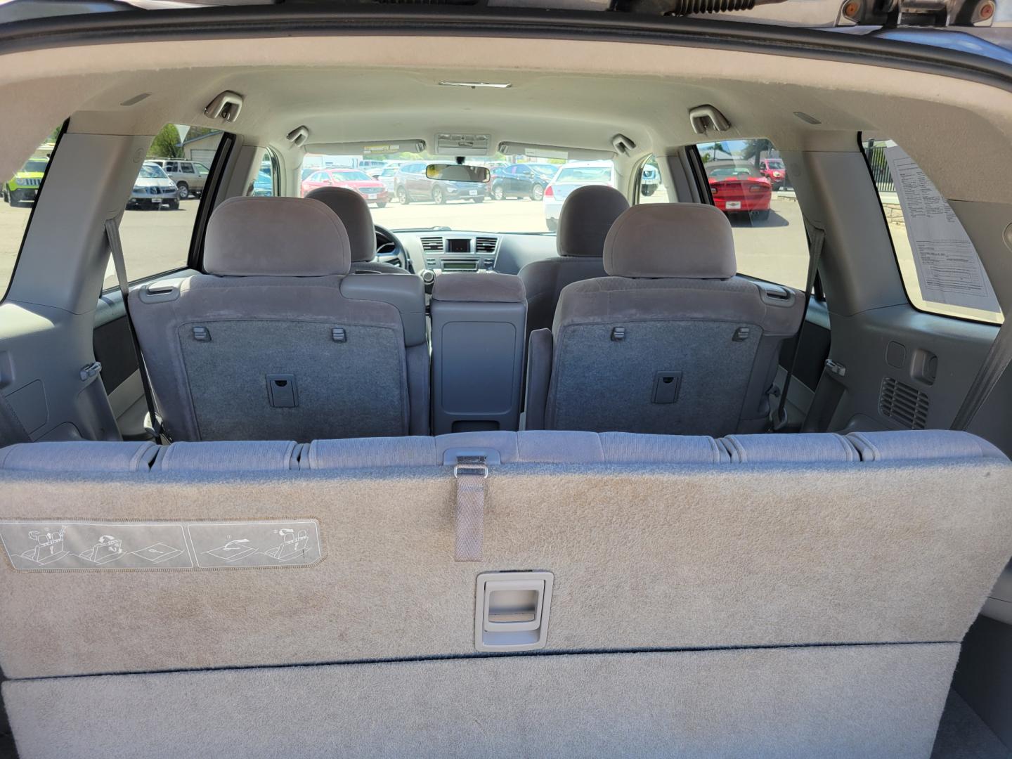 2008 Grey /Tan Toyota Highlander (JTEES41A782) with an 3.5L V6 engine, 5 Speed Automatic transmission, located at 450 N Russell, Missoula, MT, 59801, (406) 543-6600, 46.874496, -114.017433 - 3.5L V6 Engine. 4 Wheel Drive. 5 Speed Automatic Transmission. 3rd Row Seating. Power Windows and Locks. Air. Cruise. Tilt. AM FM CD Player - Photo#8