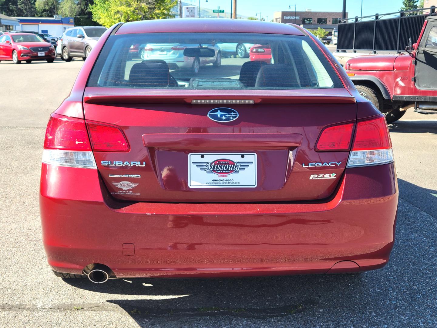 2013 Red /Tan Subaru Legacy 2.5 Premium (4S3BMBC6XD3) with an 2.5L H4 engine, Automatic transmission, located at 450 N Russell, Missoula, MT, 59801, (406) 543-6600, 46.874496, -114.017433 - Photo#4