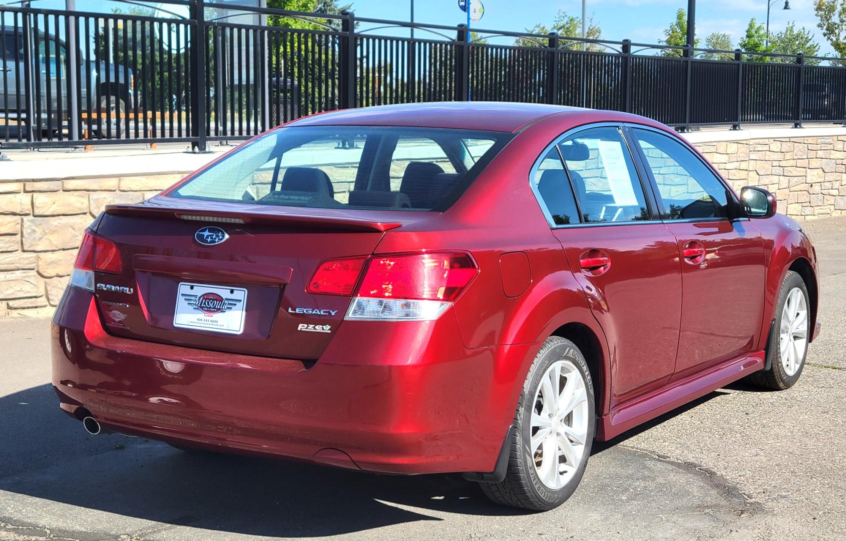 2013 Red /Tan Subaru Legacy 2.5 Premium (4S3BMBC6XD3) with an 2.5L H4 engine, Automatic transmission, located at 450 N Russell, Missoula, MT, 59801, (406) 543-6600, 46.874496, -114.017433 - Great running Suby. 2.5L H4 Engine. Automatic Transmission. Heated Seats. Power drivers Seat. Air. Cruise. Tilt. Power Windows and Locks. AM FM XM Cd Player. Small dent in Drivers door. - Photo#6