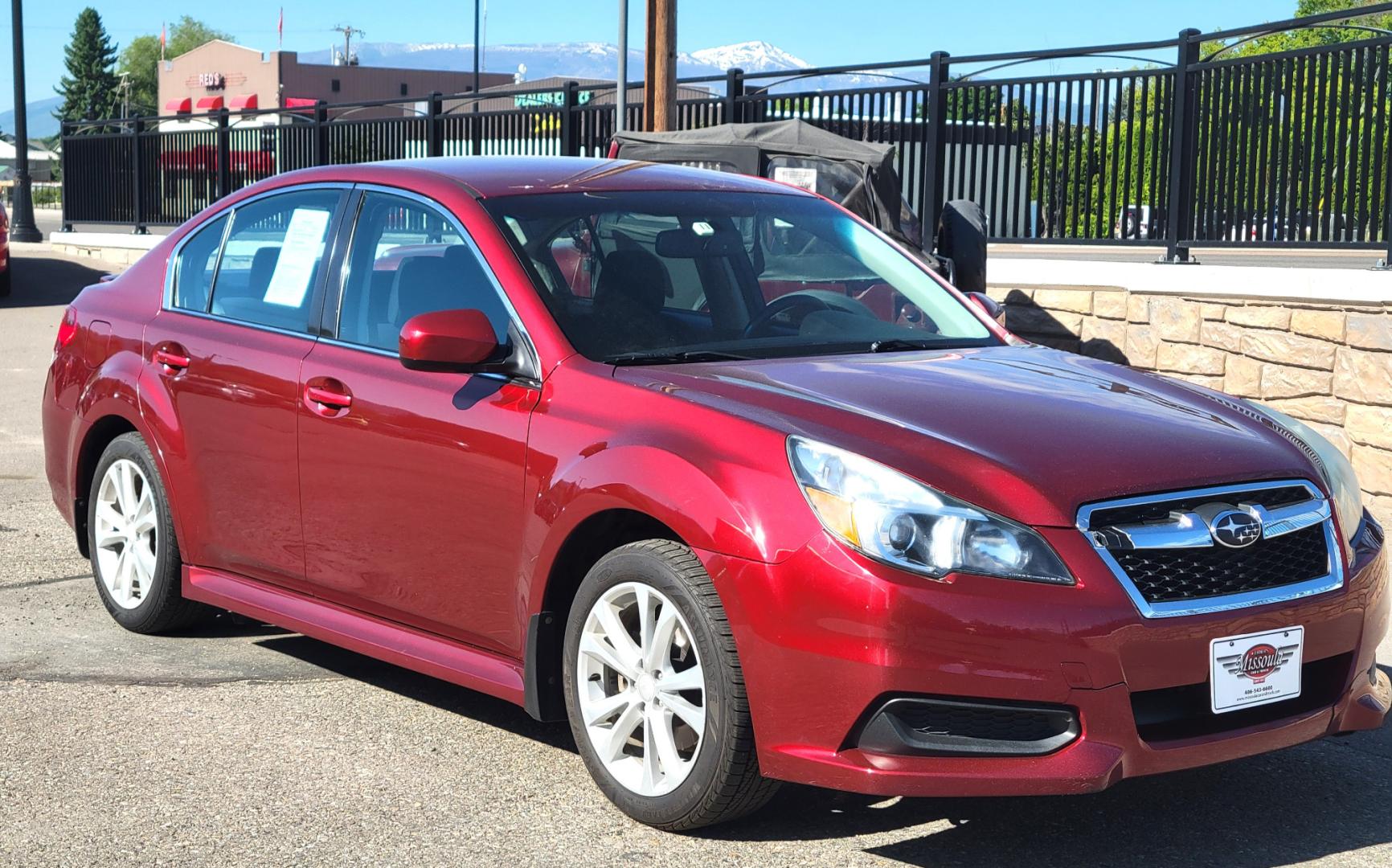 2013 Red /Tan Subaru Legacy 2.5 Premium (4S3BMBC6XD3) with an 2.5L H4 engine, Automatic transmission, located at 450 N Russell, Missoula, MT, 59801, (406) 543-6600, 46.874496, -114.017433 - Photo#7