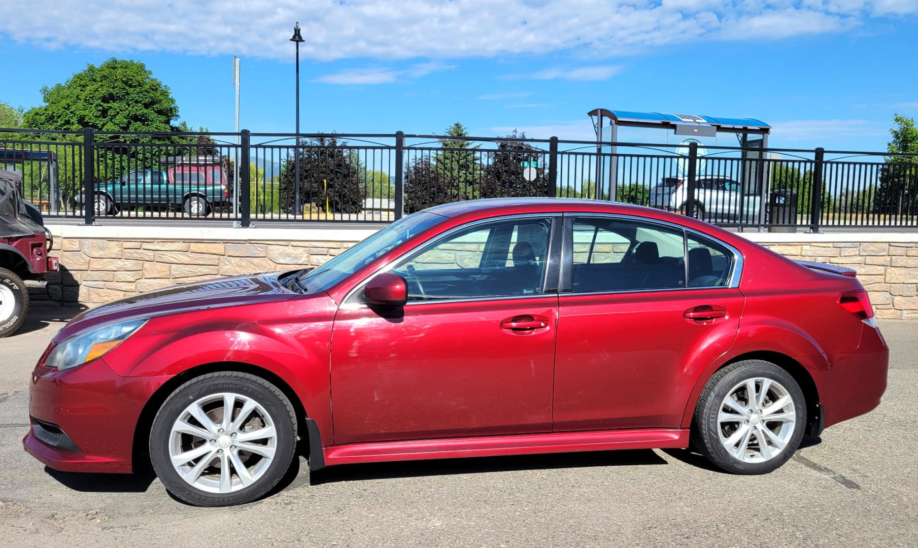 2013 Red /Tan Subaru Legacy 2.5 Premium (4S3BMBC6XD3) with an 2.5L H4 engine, Automatic transmission, located at 450 N Russell, Missoula, MT, 59801, (406) 543-6600, 46.874496, -114.017433 - Photo#1