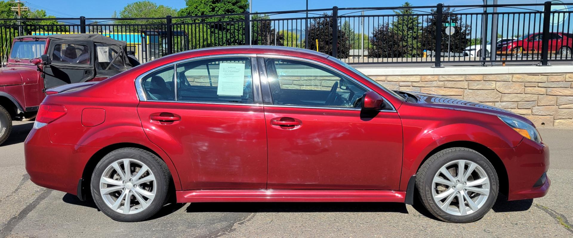 2013 Red /Tan Subaru Legacy 2.5 Premium (4S3BMBC6XD3) with an 2.5L H4 engine, Automatic transmission, located at 450 N Russell, Missoula, MT, 59801, (406) 543-6600, 46.874496, -114.017433 - Photo#2