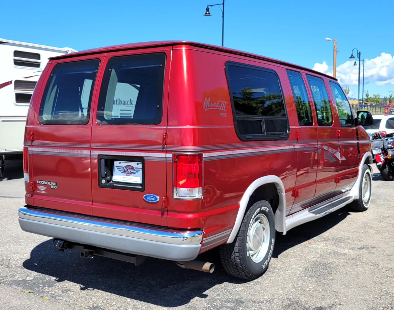 1997 Red /Tan Ford Econoline Mark III LE (1FDEE14L0VH) with an 5.4L V8 engine, Automatic transmission, located at 450 N Russell, Missoula, MT, 59801, (406) 543-6600, 46.874496, -114.017433 - Local Consignment. Very Clean. 5.4L V8 Engine. Automatic Transmission. Rear Wheel Drive. Air. Cruise. Tilt. AM FM Cassette with Cd Changer. Because of the age of this vehicle, financing is NOT available. - Photo#5