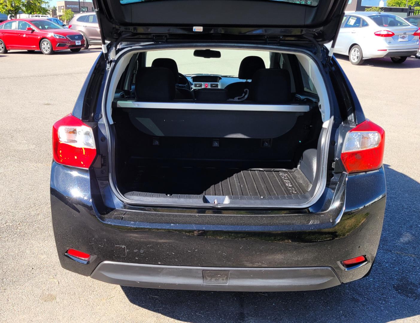 2015 Black /Black Subaru Impreza Sport Premium (JF1GPAU63F8) with an 2.0L engine, Automatic / CVT transmission, located at 450 N Russell, Missoula, MT, 59801, (406) 543-6600, 46.874496, -114.017433 - Only 78K Miles. 2.0L H4 Engine. CVT Automatic Transmission. All Wheel Drive. Backup Camera. Power Sunroof. Heated Seats. Power Windows and Locks. Air Cruise Tilt. Bluetooth. Has a dent in Passenger Door. - Photo#6