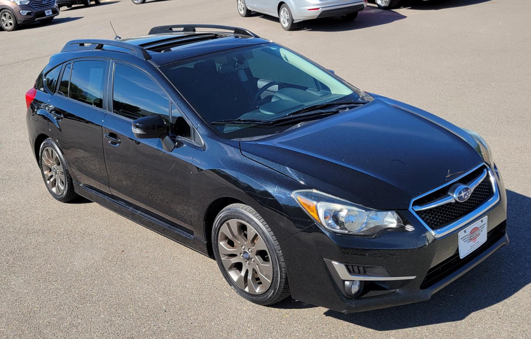 2015 Black /Black Subaru Impreza Sport Premium (JF1GPAU63F8) with an 2.0L engine, Automatic / CVT transmission, located at 450 N Russell, Missoula, MT, 59801, (406) 543-6600, 46.874496, -114.017433 - Only 78K Miles. 2.0L H4 Engine. CVT Automatic Transmission. All Wheel Drive. Backup Camera. Power Sunroof. Heated Seats. Power Windows and Locks. Air Cruise Tilt. Bluetooth. Has a dent in Passenger Door. - Photo#7