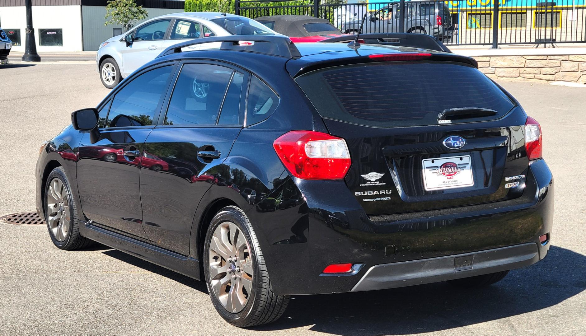 2015 Black /Black Subaru Impreza Sport Premium (JF1GPAU63F8) with an 2.0L engine, Automatic / CVT transmission, located at 450 N Russell, Missoula, MT, 59801, (406) 543-6600, 46.874496, -114.017433 - Only 78K Miles. 2.0L H4 Engine. CVT Automatic Transmission. All Wheel Drive. Backup Camera. Power Sunroof. Heated Seats. Power Windows and Locks. Air Cruise Tilt. Bluetooth. Has a dent in Passenger Door. - Photo#4