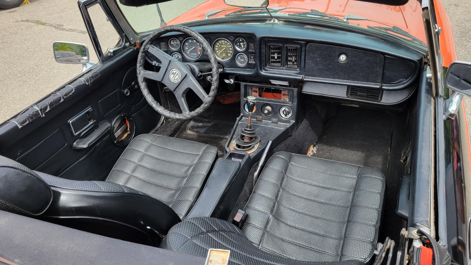 1979 Orange /Black MG Midget (FLA9L489955) with an 1.5L I4 engine, 4 Speed Manual transmission, located at 450 N Russell, Missoula, MT, 59801, (406) 543-6600, 46.874496, -114.017433 - Cute little Convertible. Runs well. 4 Speed manual Transmission. Body is very straight. Because of age. Financing is NOT Available. - Photo#9