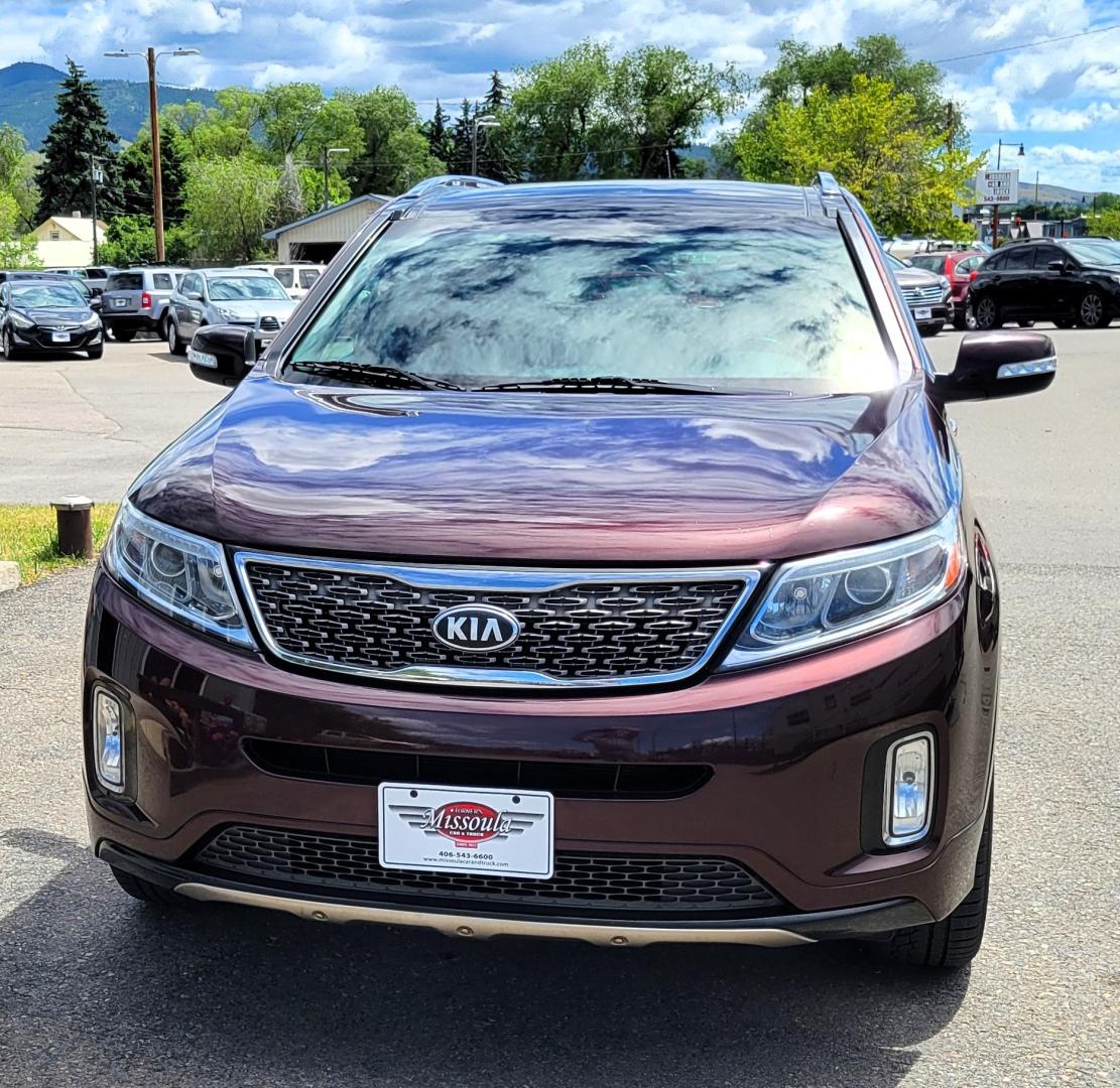 2014 Maroon /Black Kia Sorento SX (5XYKWDA7XEG) with an 3.3L V6 engine, 6 Speed Auto transmission, located at 450 N Russell, Missoula, MT, 59801, (406) 543-6600, 46.874496, -114.017433 - Beautiful AWD SUV. 3.3L V6 Engine. 6 Speed Automatic Transmission. Power Sunroof. Heated Leather Power Seats. Navigation. 3rd Row Seating. Bluetooth. Backup Camera. Front and Rear Climate Control. Power Rear Gate. Clean Carfax. - Photo#2