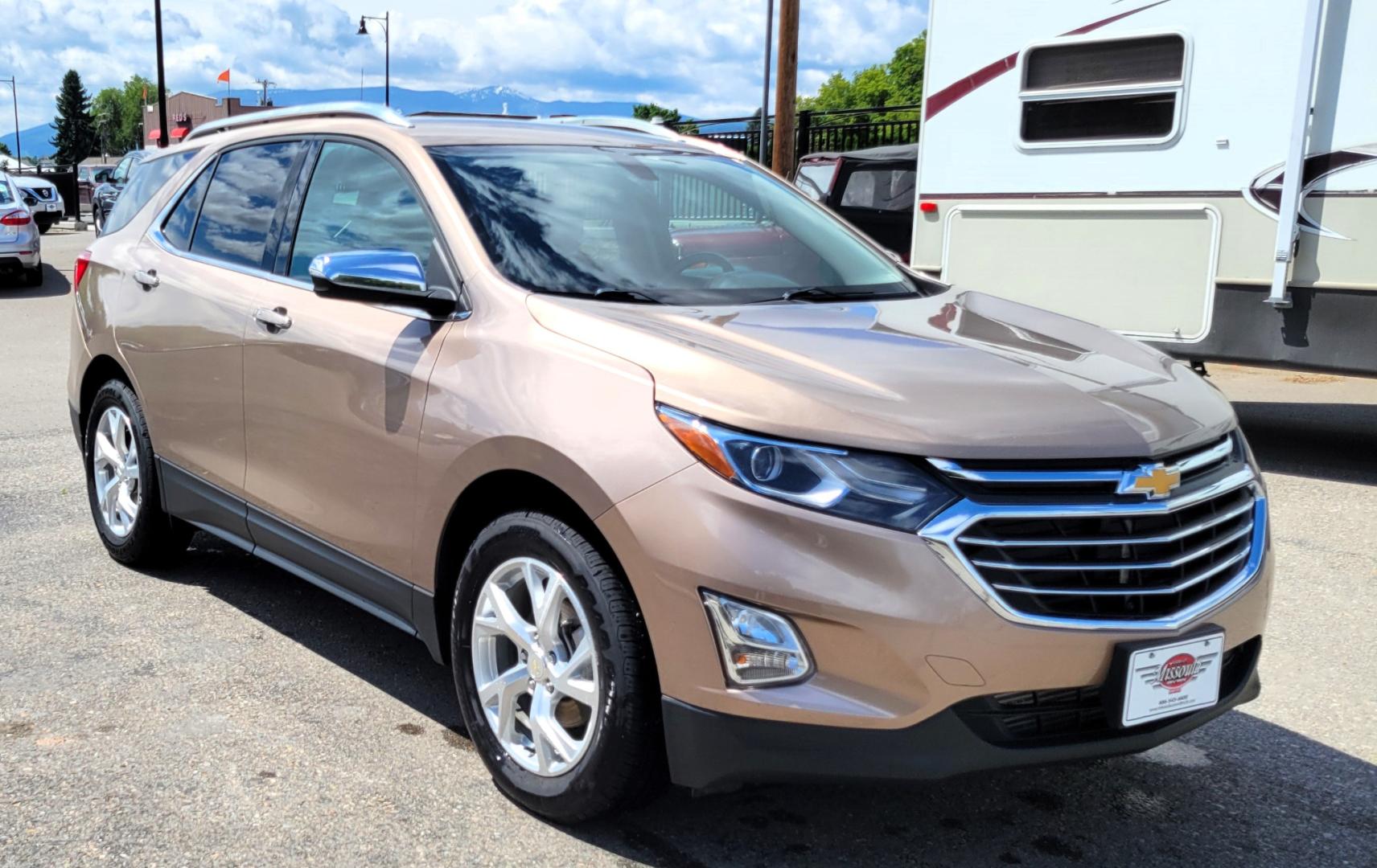 2018 Gold /Black Chevrolet Equinox Premium (3GNAXXEU8JL) with an 1.6L I4 engine, 6 Speed Auto transmission, located at 450 N Russell, Missoula, MT, 59801, (406) 543-6600, 46.874496, -114.017433 - Incredible hard to find AWD Diesel SUV. 1.6 I4 Engine. 6 Speed Automatic Transmission. Heated Leather Seats. Power Drivers Seat. Air Cruise Tilt. Power Windows and Locks. Bluetooth. backup Camera. Navigation. - Photo#4