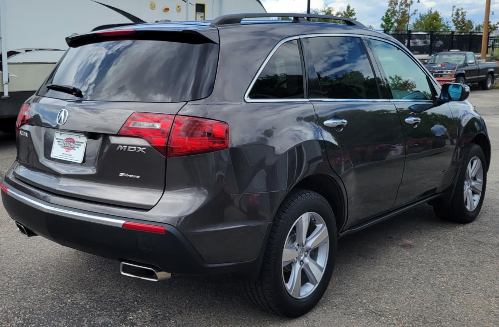 2012 Grey /Black Acura MDX Tech Package (2HNYD2H35CH) with an 3.7L V6 engine, 6 Speed Auto transmission, located at 450 N Russell, Missoula, MT, 59801, (406) 543-6600, 46.874496, -114.017433 - All Wheel Drive Acura MDX. 3.7 V6 Engine. 6 Speed Automatic Transmission. Heated Leather Seats. Power Sunroof. 3rd Row Seating. Bluetooth. Backup Camera. AM FM XM CD P,layer. Navigation. Front and Rear Air Conditioning. Power Windows and Locks. NEW TIRES! - Photo#6