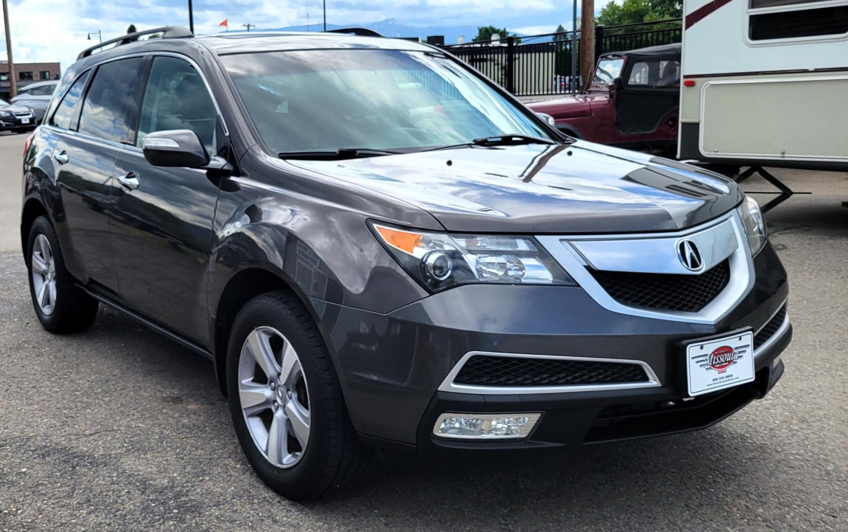 2012 Grey /Black Acura MDX Tech Package (2HNYD2H35CH) with an 3.7L V6 engine, 6 Speed Auto transmission, located at 450 N Russell, Missoula, MT, 59801, (406) 543-6600, 46.874496, -114.017433 - All Wheel Drive Acura MDX. 3.7 V6 Engine. 6 Speed Automatic Transmission. Heated Leather Seats. Power Sunroof. 3rd Row Seating. Bluetooth. Backup Camera. AM FM XM CD P,layer. Navigation. Front and Rear Air Conditioning. Power Windows and Locks. NEW TIRES! - Photo#3