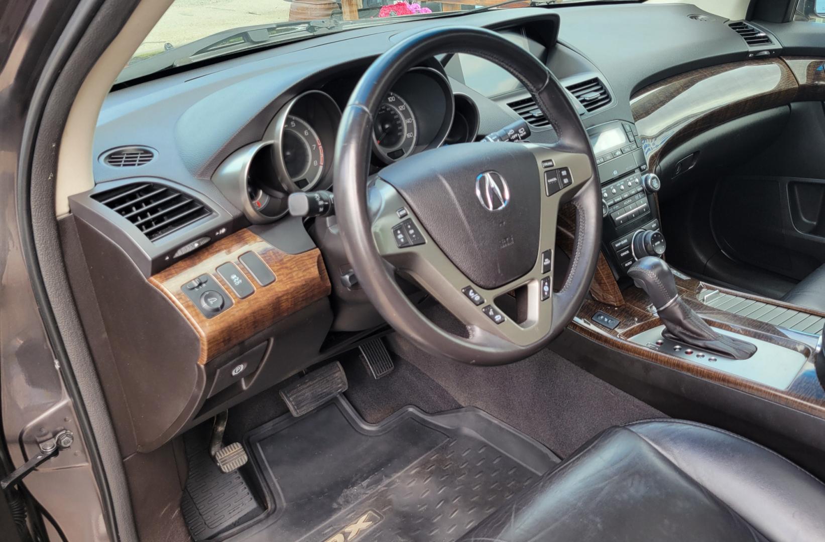 2012 Grey /Black Acura MDX Tech Package (2HNYD2H35CH) with an 3.7L V6 engine, 6 Speed Auto transmission, located at 450 N Russell, Missoula, MT, 59801, (406) 543-6600, 46.874496, -114.017433 - All Wheel Drive Acura MDX. 3.7 V6 Engine. 6 Speed Automatic Transmission. Heated Leather Seats. Power Sunroof. 3rd Row Seating. Bluetooth. Backup Camera. AM FM XM CD P,layer. Navigation. Front and Rear Air Conditioning. Power Windows and Locks. NEW TIRES! - Photo#16