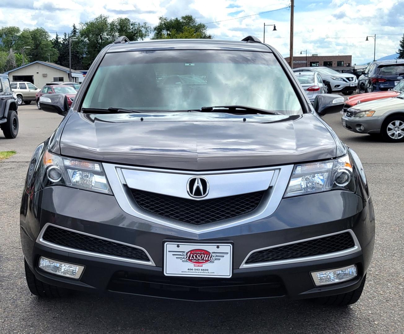 2012 Grey /Black Acura MDX Tech Package (2HNYD2H35CH) with an 3.7L V6 engine, 6 Speed Auto transmission, located at 450 N Russell, Missoula, MT, 59801, (406) 543-6600, 46.874496, -114.017433 - All Wheel Drive Acura MDX. 3.7 V6 Engine. 6 Speed Automatic Transmission. Heated Leather Seats. Power Sunroof. 3rd Row Seating. Bluetooth. Backup Camera. AM FM XM CD P,layer. Navigation. Front and Rear Air Conditioning. Power Windows and Locks. NEW TIRES! - Photo#2