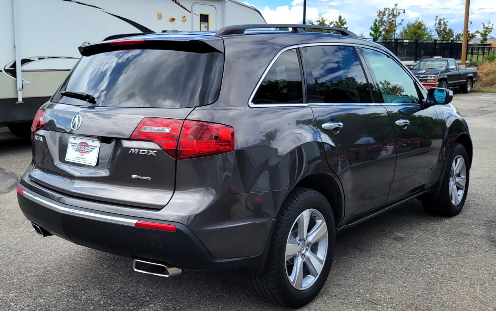 2012 Grey /Black Acura MDX Tech Package (2HNYD2H35CH) with an 3.7L V6 engine, 6 Speed Auto transmission, located at 450 N Russell, Missoula, MT, 59801, (406) 543-6600, 46.874496, -114.017433 - All Wheel Drive Acura MDX. 3.7 V6 Engine. 6 Speed Automatic Transmission. Heated Leather Seats. Power Sunroof. 3rd Row Seating. Bluetooth. Backup Camera. AM FM XM CD P,layer. Navigation. Front and Rear Air Conditioning. Power Windows and Locks. NEW TIRES! - Photo#5