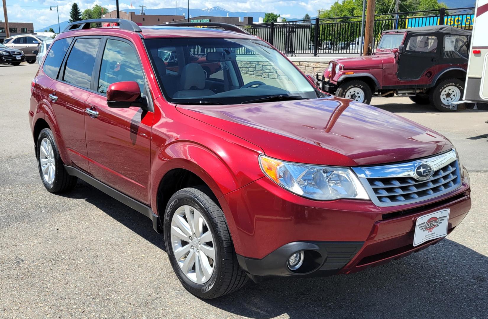 2012 Red /Tan Subaru Forester 2.5X Limited (JF2SHAECXCH) with an 2.5L H4 engine, 4 Speed Auto transmission, located at 450 N Russell, Missoula, MT, 59801, (406) 543-6600, 46.874496, -114.017433 - All Wheel Drive. 2.5L H4 Engine. 4 Speed manual Transmission. Huge Power Sunroof. Air. Cruise. Tilt. Heated Seats. Bluetooth. AM FM XM CD. Backup Camera. Runs Great!Timing Chain not Timing Belt. - Photo#3