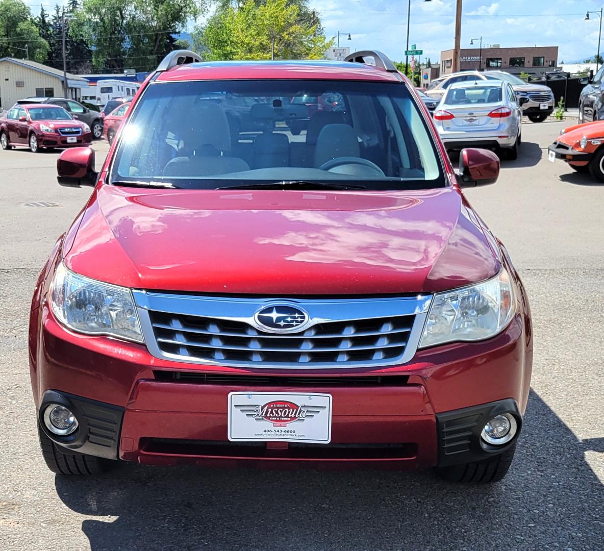 2012 Red /Tan Subaru Forester 2.5X Limited (JF2SHAECXCH) with an 2.5L H4 engine, 4 Speed Auto transmission, located at 450 N Russell, Missoula, MT, 59801, (406) 543-6600, 46.874496, -114.017433 - All Wheel Drive. 2.5L H4 Engine. 4 Speed manual Transmission. Huge Power Sunroof. Air. Cruise. Tilt. Heated Seats. Bluetooth. AM FM XM CD. Backup Camera. Runs Great!Timing Chain not Timing Belt. - Photo#2