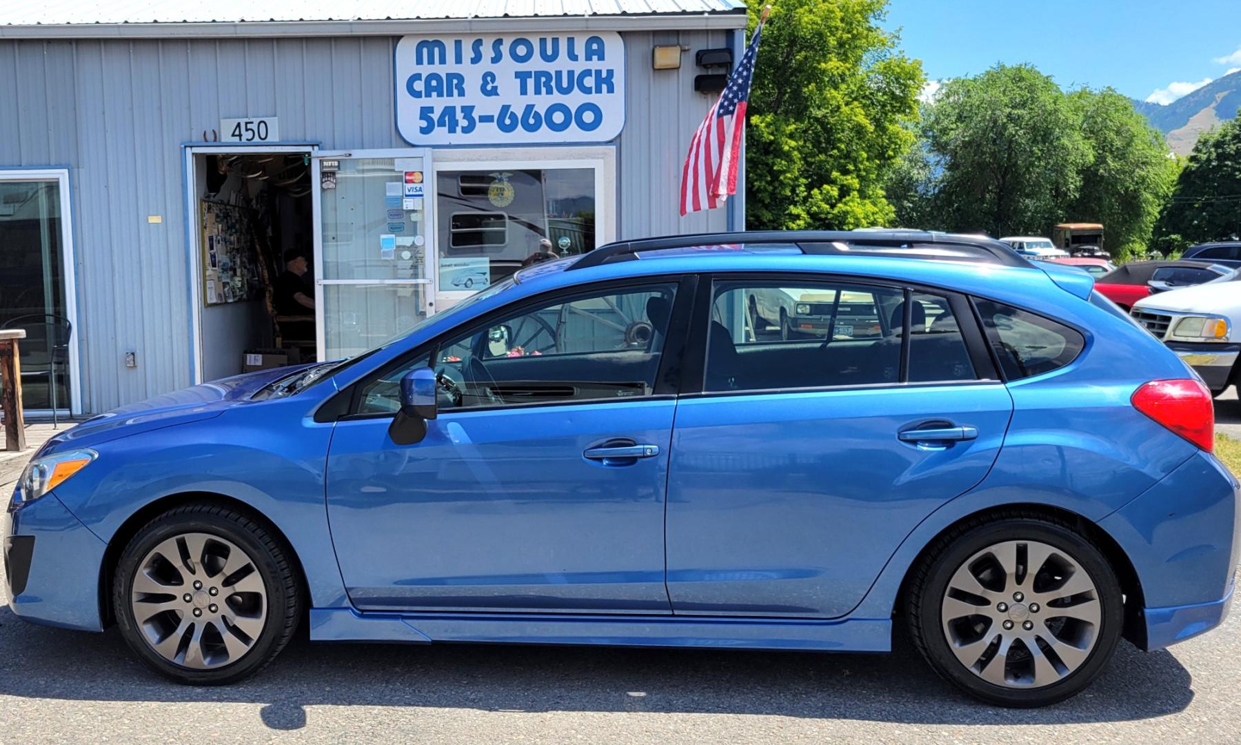 2014 Blue /Black Subaru Impreza 2.0 Sport Premium (JF1GPAL63E9) with an 2.0L H4 engine, 5 Speed Manual transmission, located at 450 N Russell, Missoula, MT, 59801, (406) 543-6600, 46.874496, -114.017433 - 1 Owner. Clean Carfax. Great Gas Mileage. AWD. 5 Speed Manual Transmission. 2.0L H4 Engine. Bluetooth. Heated Seats. Power Windows and Locks. Air Cruise Tilt. AM CD CD. Tires are Excellent. - Photo#0