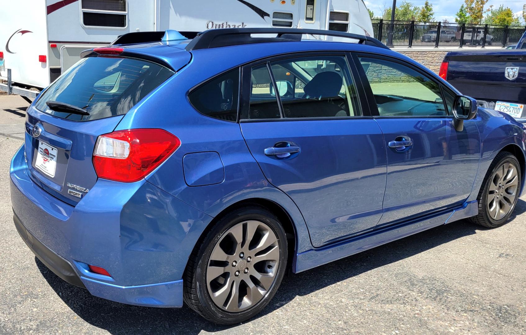 2014 Blue /Black Subaru Impreza 2.0 Sport Premium (JF1GPAL63E9) with an 2.0L H4 engine, 5 Speed Manual transmission, located at 450 N Russell, Missoula, MT, 59801, (406) 543-6600, 46.874496, -114.017433 - 1 Owner. Clean Carfax. Great Gas Mileage. AWD. 5 Speed Manual Transmission. 2.0L H4 Engine. Bluetooth. Heated Seats. Power Windows and Locks. Air Cruise Tilt. AM CD CD. Tires are Excellent. - Photo#4