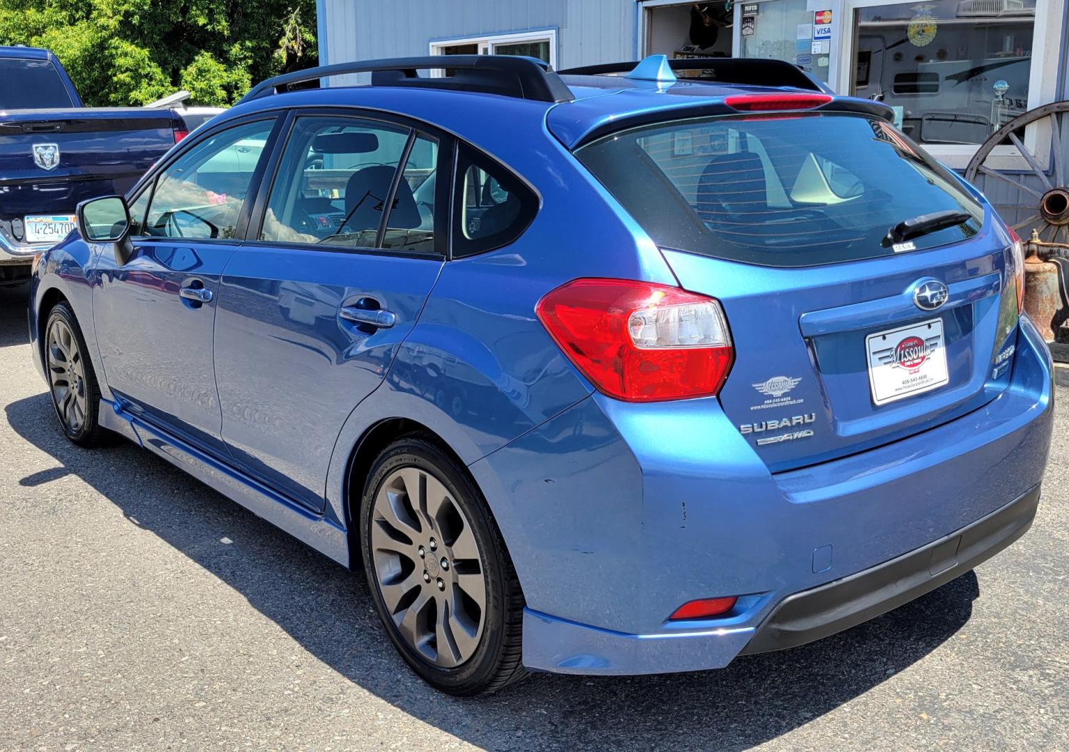 2014 Blue /Black Subaru Impreza 2.0 Sport Premium (JF1GPAL63E9) with an 2.0L H4 engine, 5 Speed Manual transmission, located at 450 N Russell, Missoula, MT, 59801, (406) 543-6600, 46.874496, -114.017433 - 1 Owner. Clean Carfax. Great Gas Mileage. AWD. 5 Speed Manual Transmission. 2.0L H4 Engine. Bluetooth. Heated Seats. Power Windows and Locks. Air Cruise Tilt. AM CD CD. Tires are Excellent. - Photo#5