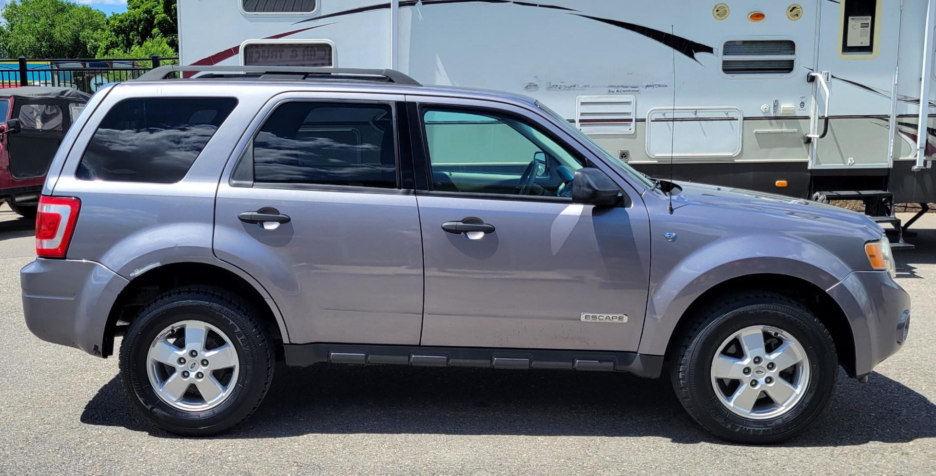 2008 Grey /Tan Ford Escape (1FMCU93138K) with an 3.0L V6 engine, 4 Speed Automatic transmission, located at 450 N Russell, Missoula, MT, 59801, (406) 543-6600, 46.874496, -114.017433 - Photo#4