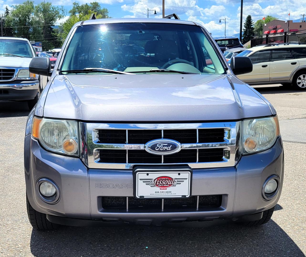 2008 Grey /Tan Ford Escape (1FMCU93138K) with an 3.0L V6 engine, 4 Speed Automatic transmission, located at 450 N Russell, Missoula, MT, 59801, (406) 543-6600, 46.874496, -114.017433 - Photo#2