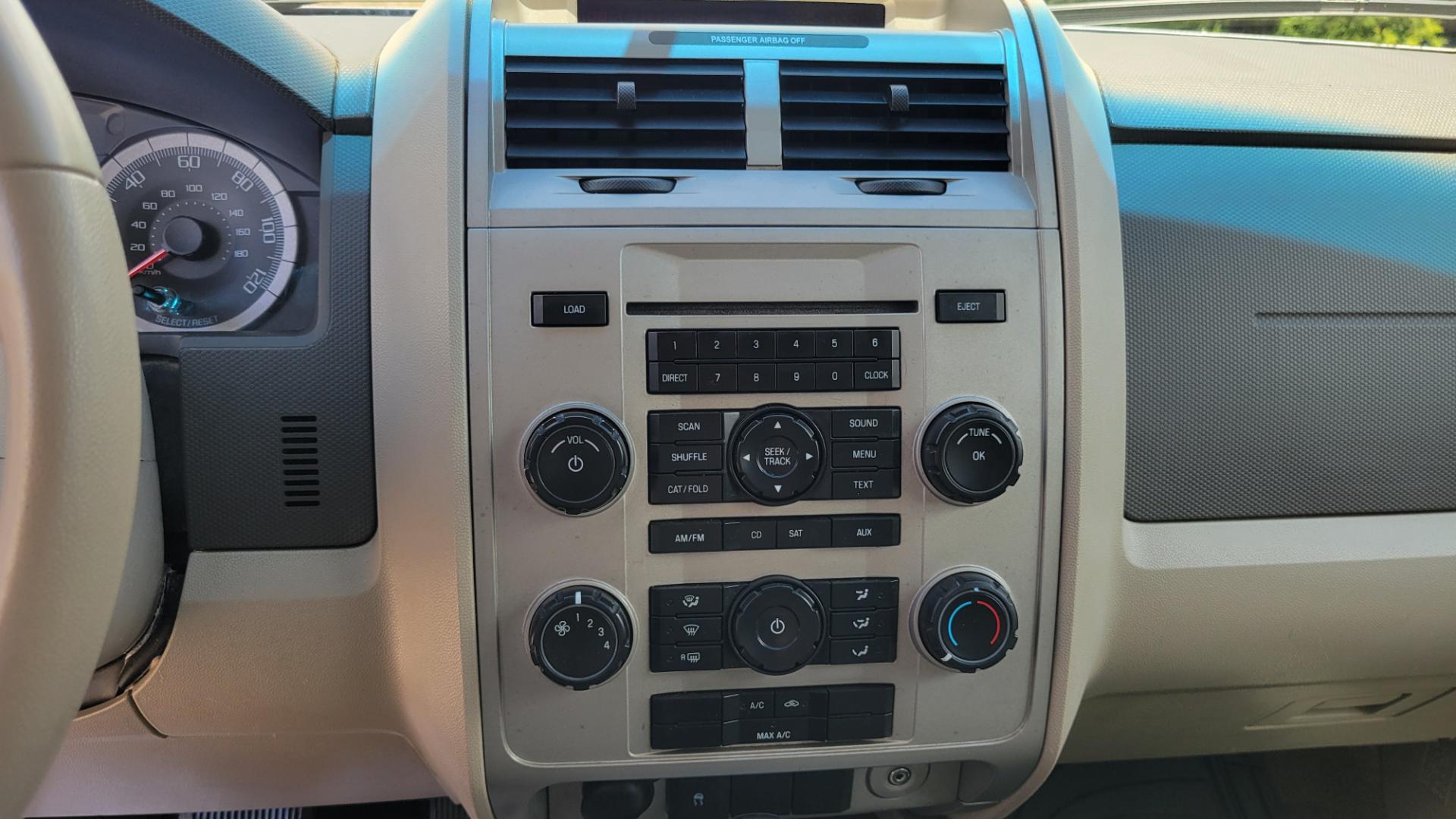 2008 Grey /Tan Ford Escape (1FMCU93138K) with an 3.0L V6 engine, 4 Speed Automatic transmission, located at 450 N Russell, Missoula, MT, 59801, (406) 543-6600, 46.874496, -114.017433 - Runs Great. 3.0L V6 Engine. All Wheel Drive. 4 Speed Automatic Transmission. Good Tires. Power Windows and Locks. Air. Cruise. Tilt. Power Drivers Seat. AM FM CD. - Photo#12